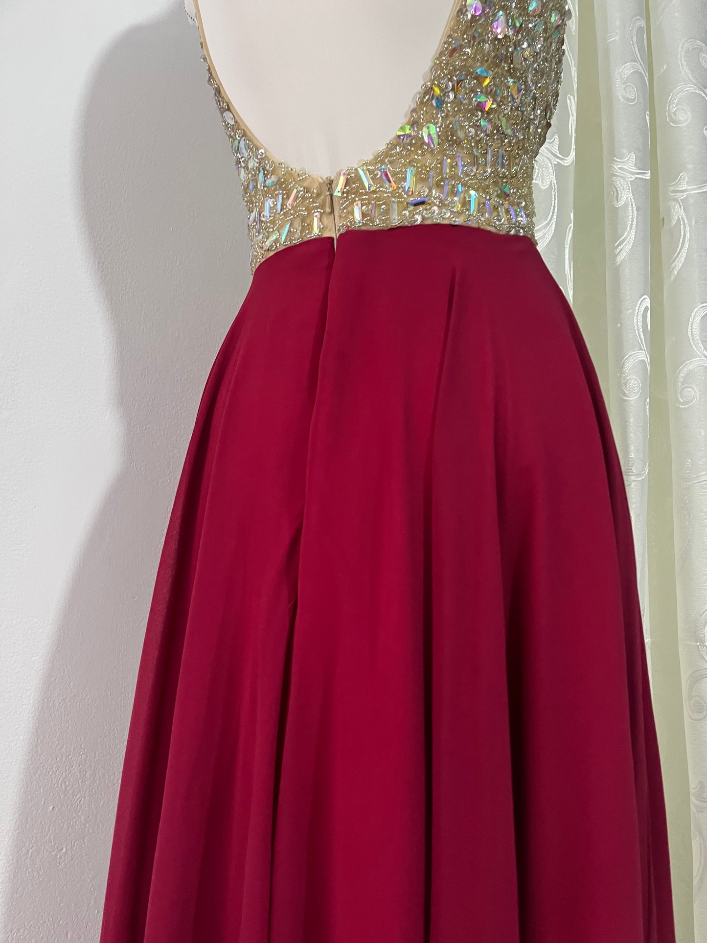 Evening gown with a bodice exquisitely hand-decorated with rhinestones and embellishments