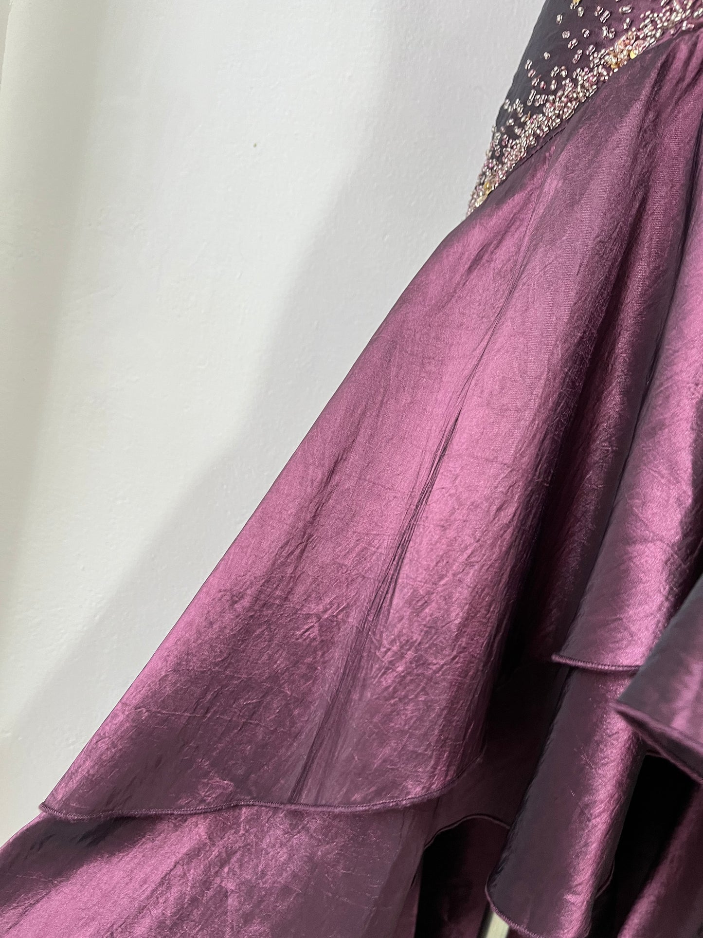 Deep purple corset dress with exquisite embellishments and hand-embroidered beads