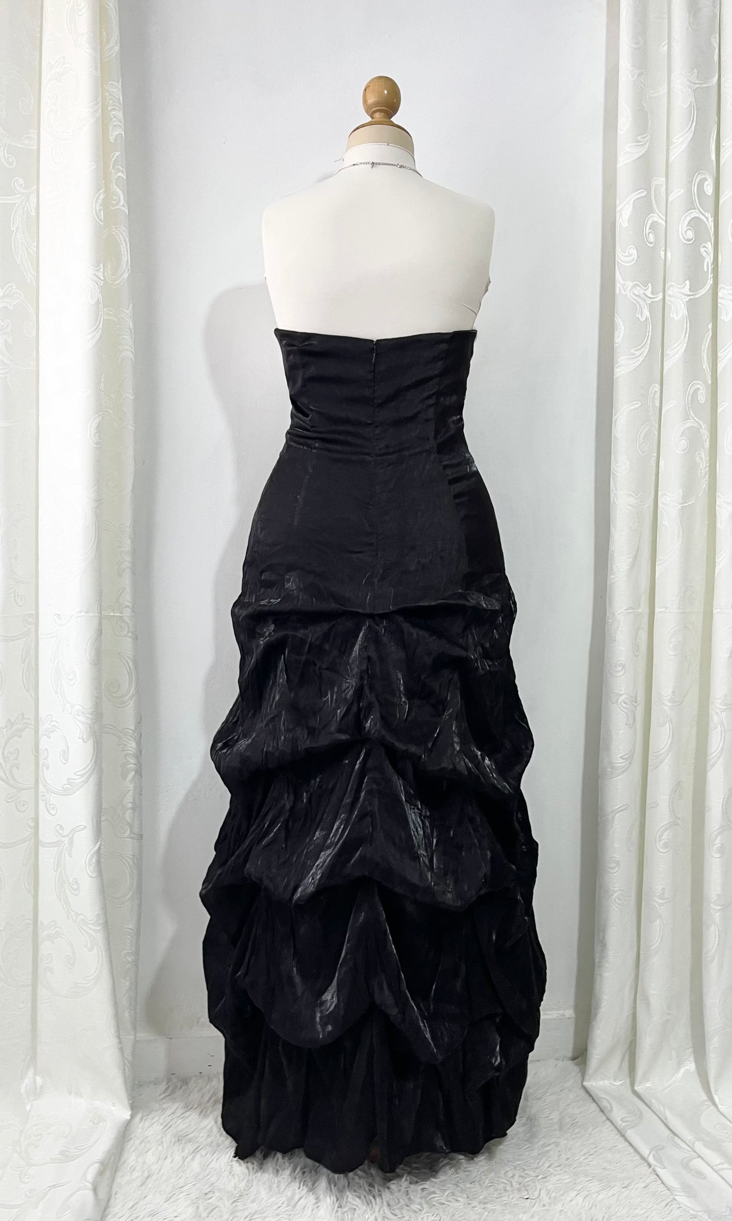 Noir and ivory gown with a skirt featuring gathered details, rhinestone appliqués, and sparkling embellishments.- size M/L