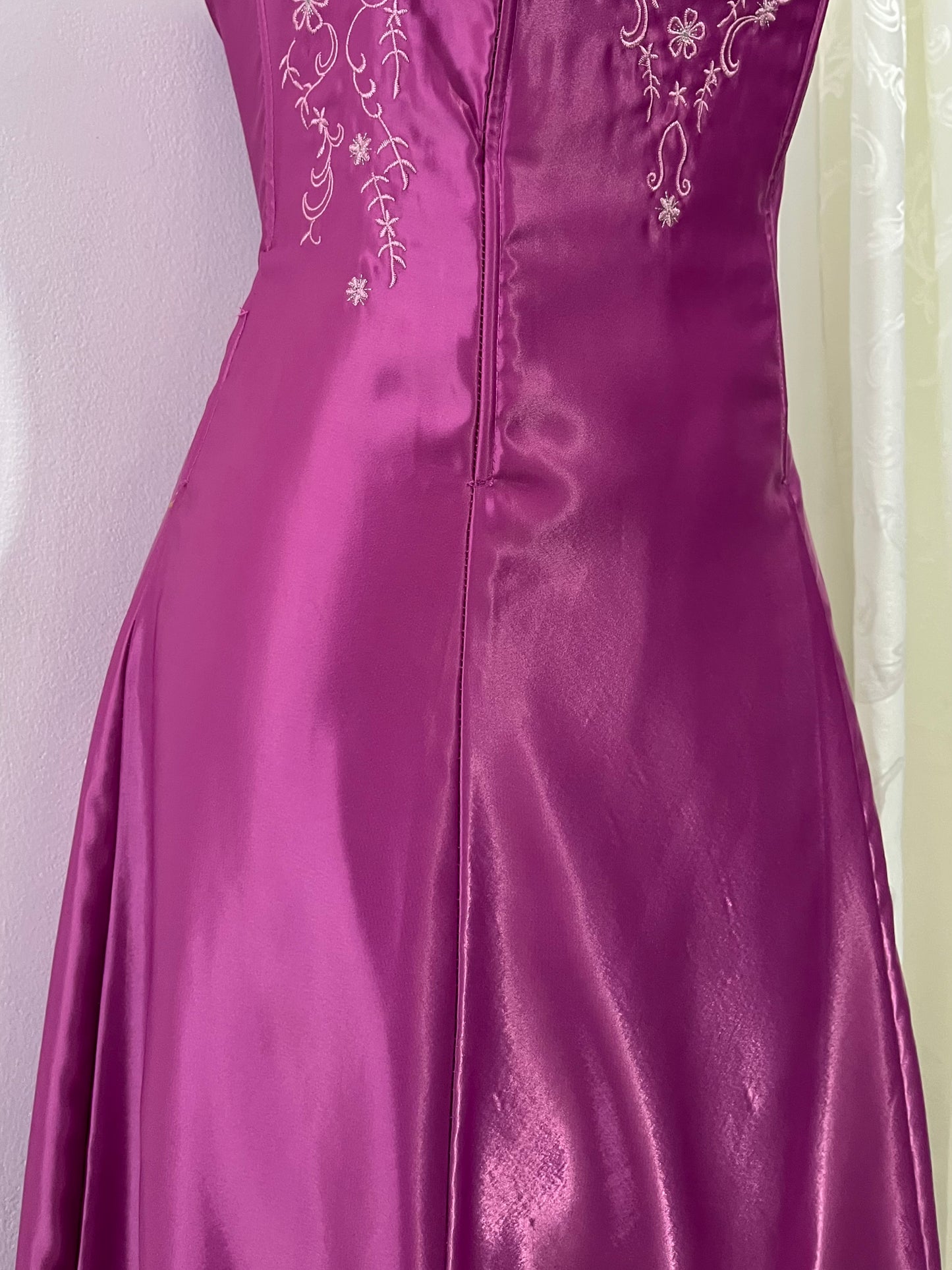 Magenta corset dress with floral designs embroidered in lilac and silver thread