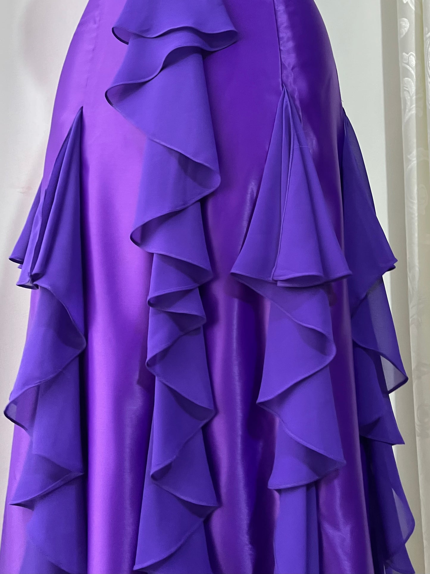 Royal purple corset gown with ruffles