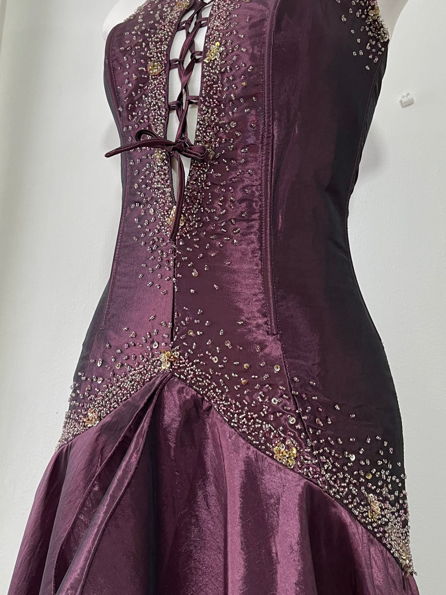 Deep purple corset dress with exquisite embellishments and hand-embroidered beads