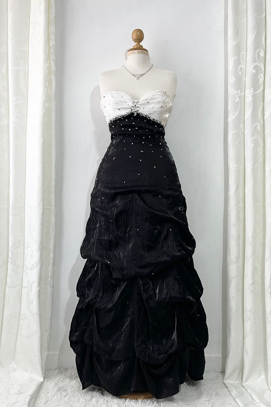 Noir and ivory gown with a skirt featuring gathered details, rhinestone appliqués, and sparkling embellishments.- size M/L
