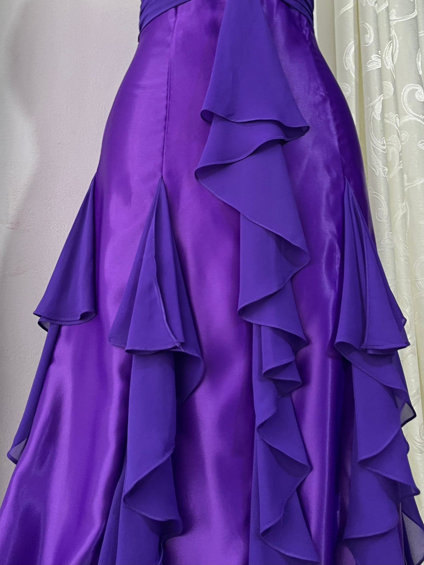 Royal purple corset gown with ruffles