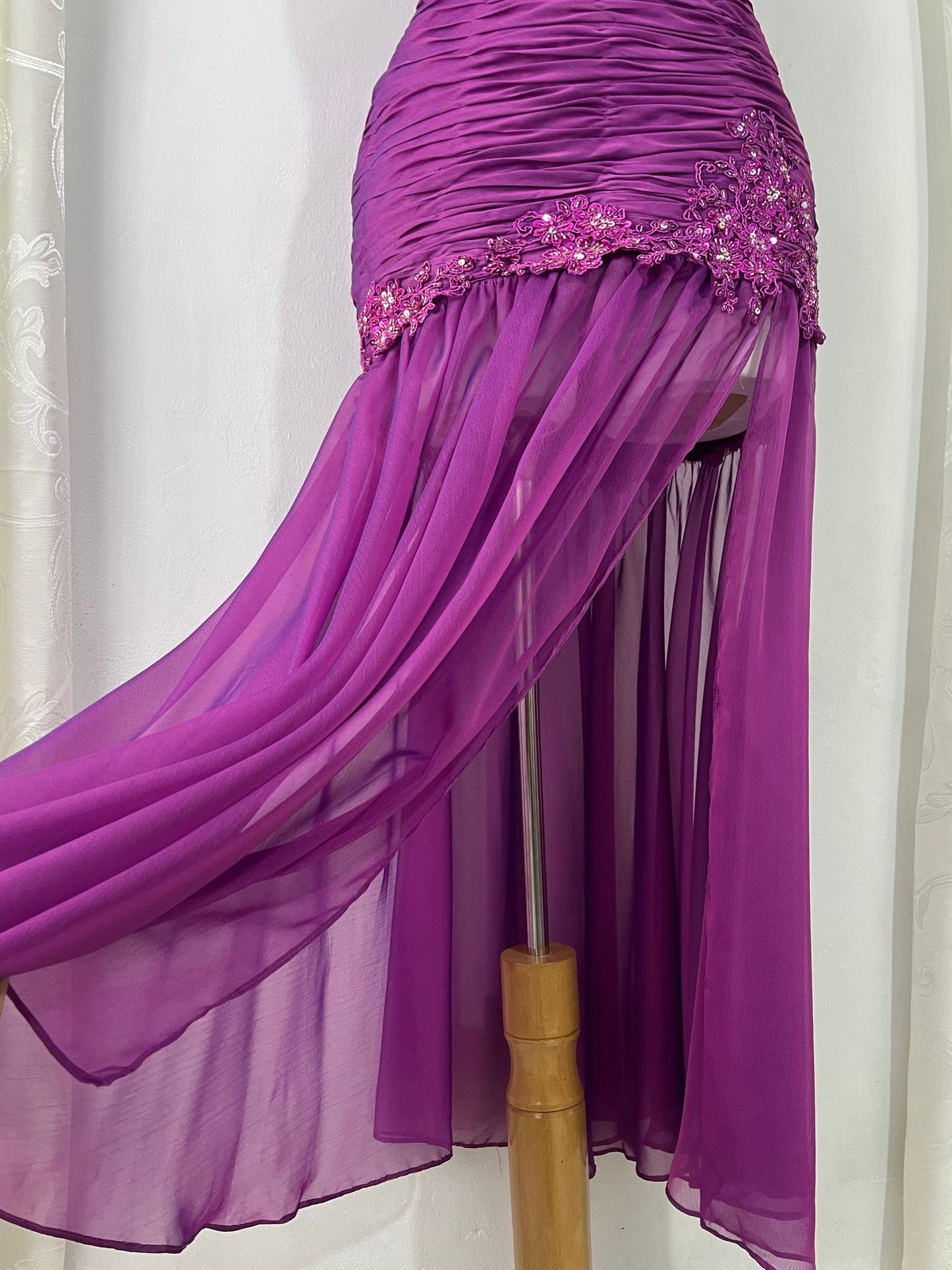 Purple corset dress with embroidered sequin and floral designs