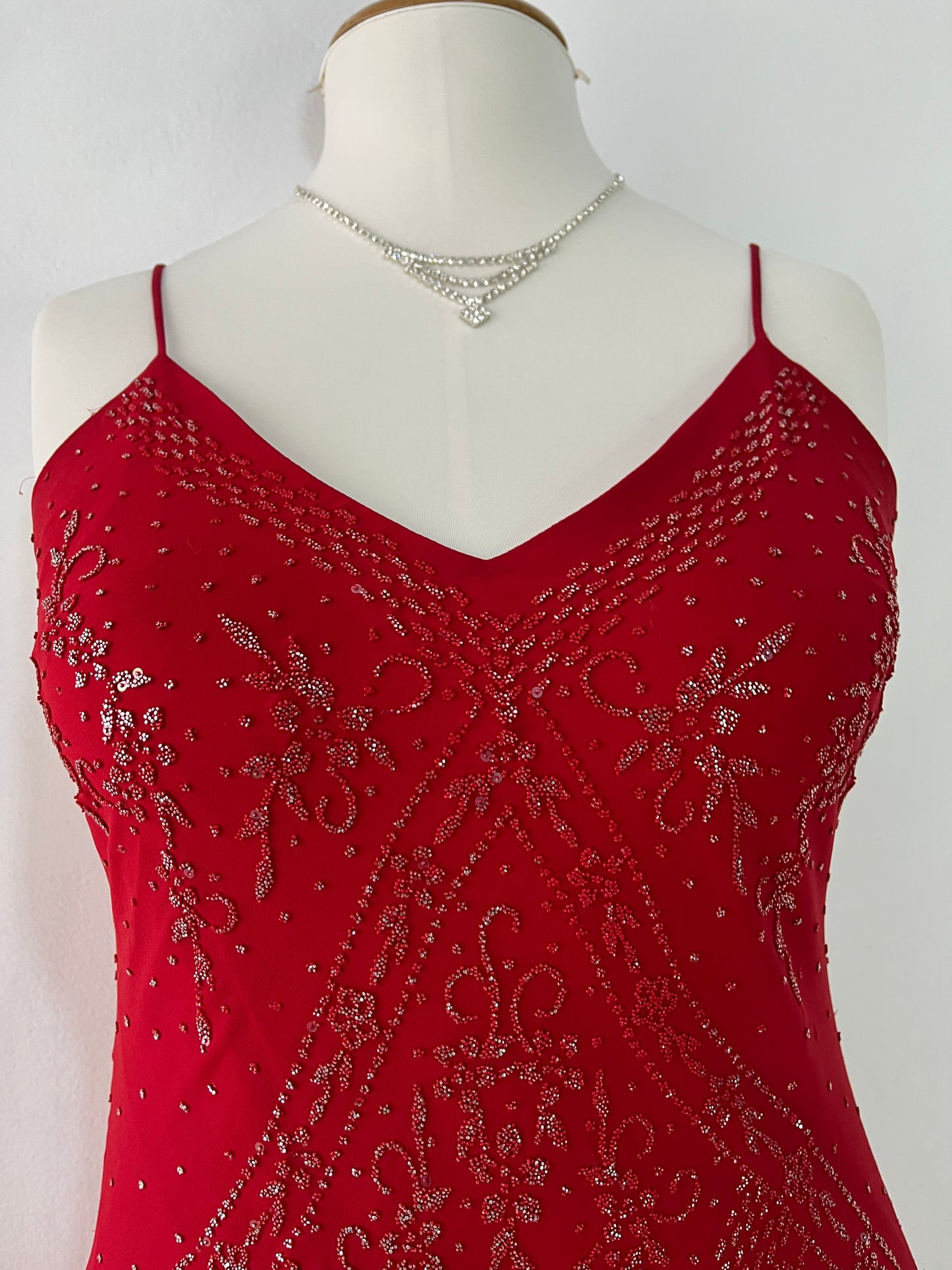 Crimson red ball gown with silver embellishments