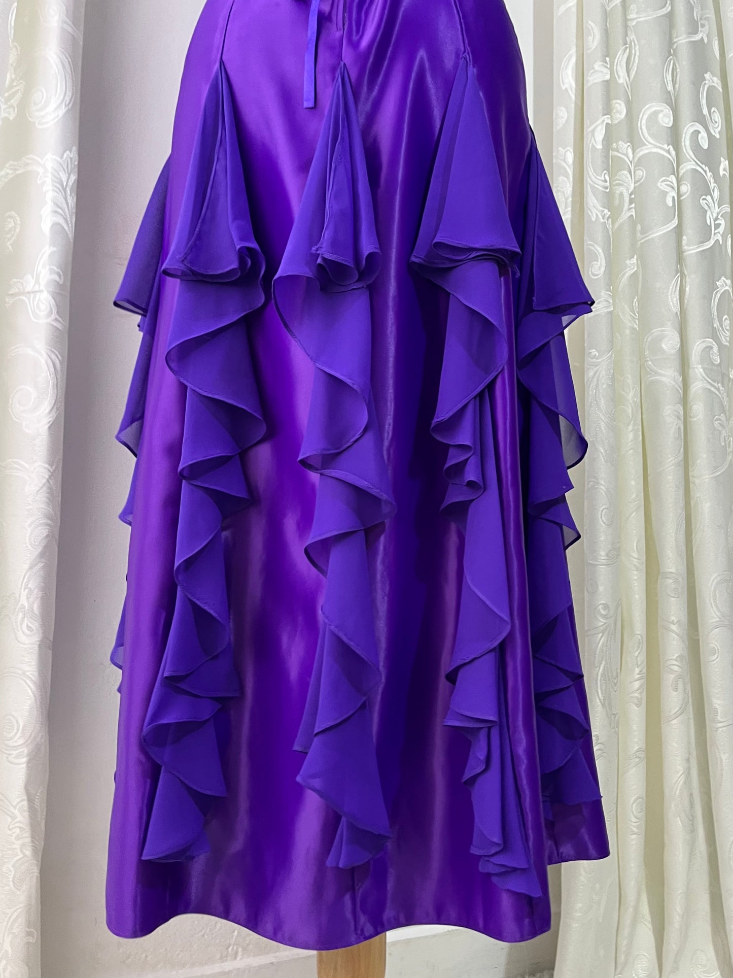 Royal purple corset gown with ruffles