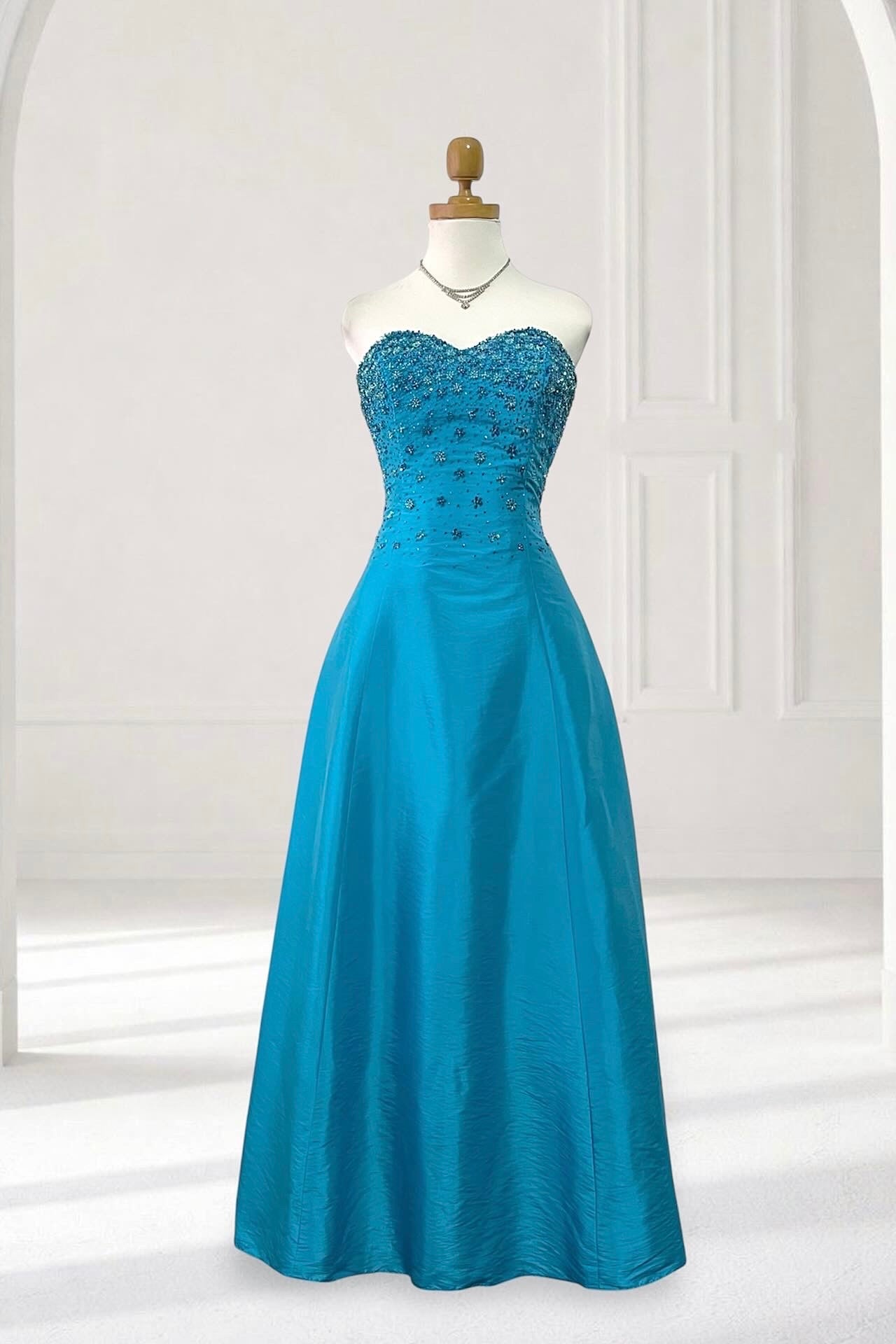 Corset evening dress in a vibrant turquoise color with exquisite handmade floral embroidery- size S