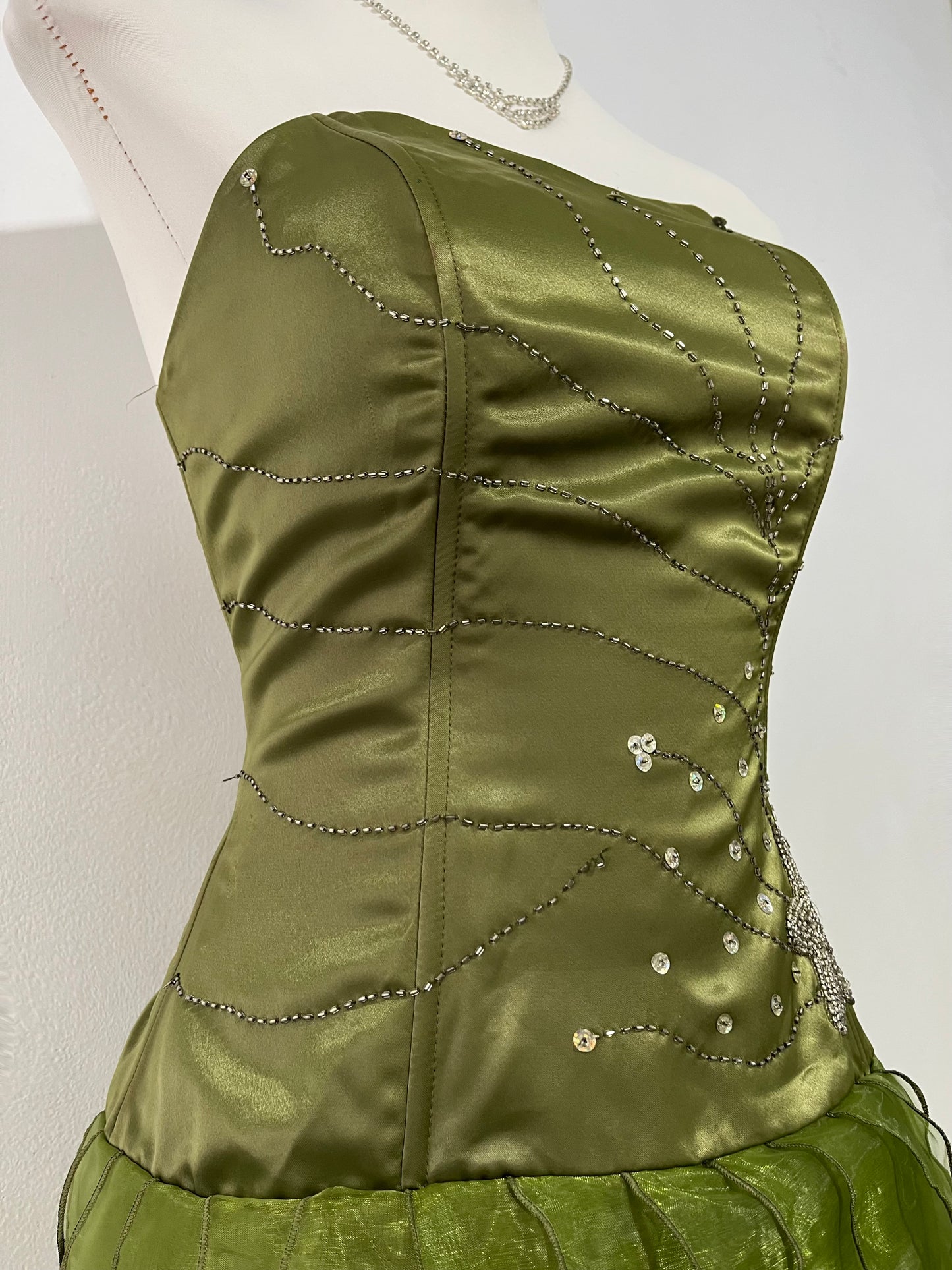 Olive green high-low corset dress with hand-embroidered rhinestones and ruffles- size S