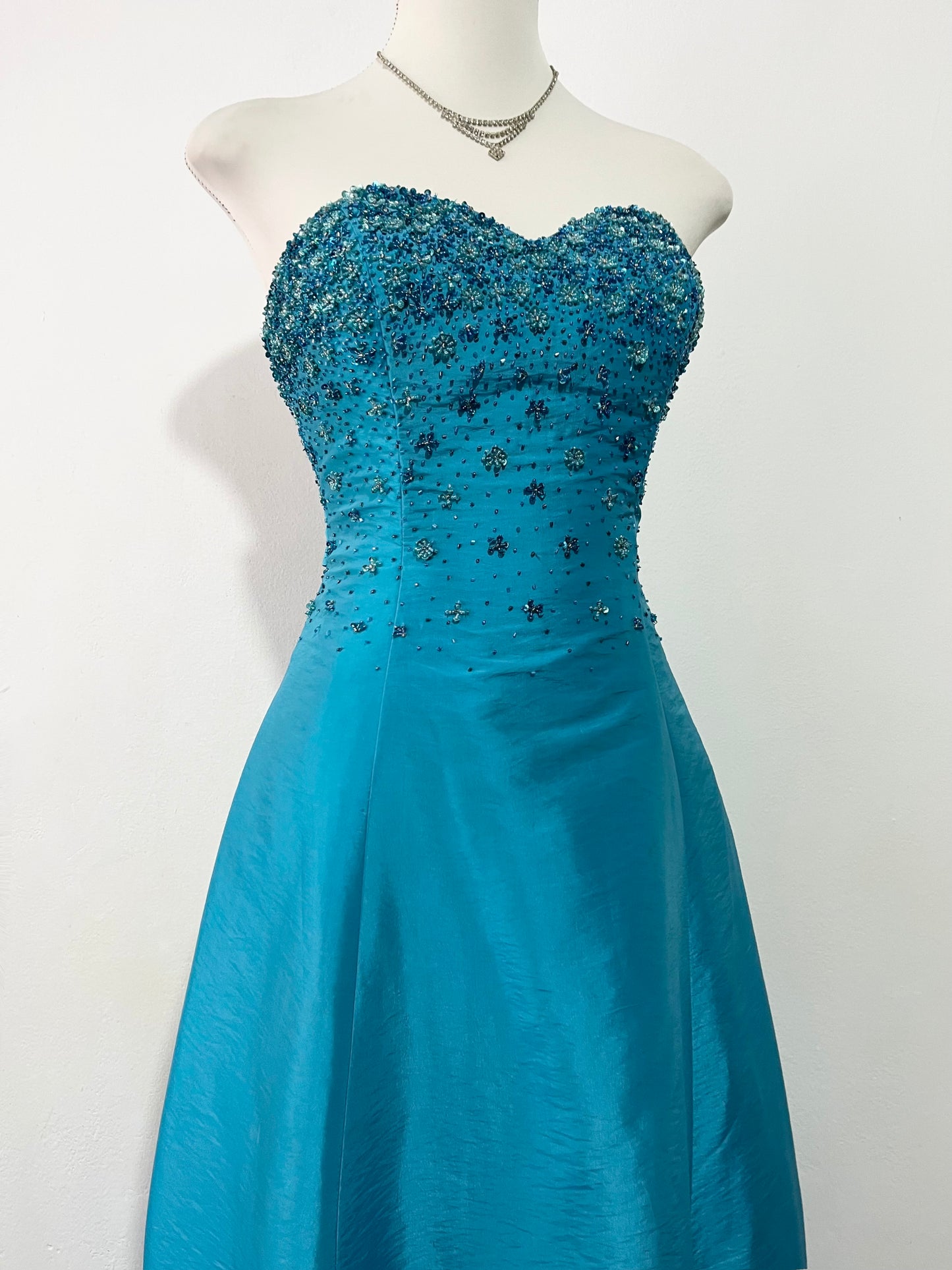 Corset evening dress in a vibrant turquoise color with exquisite handmade floral embroidery- size S