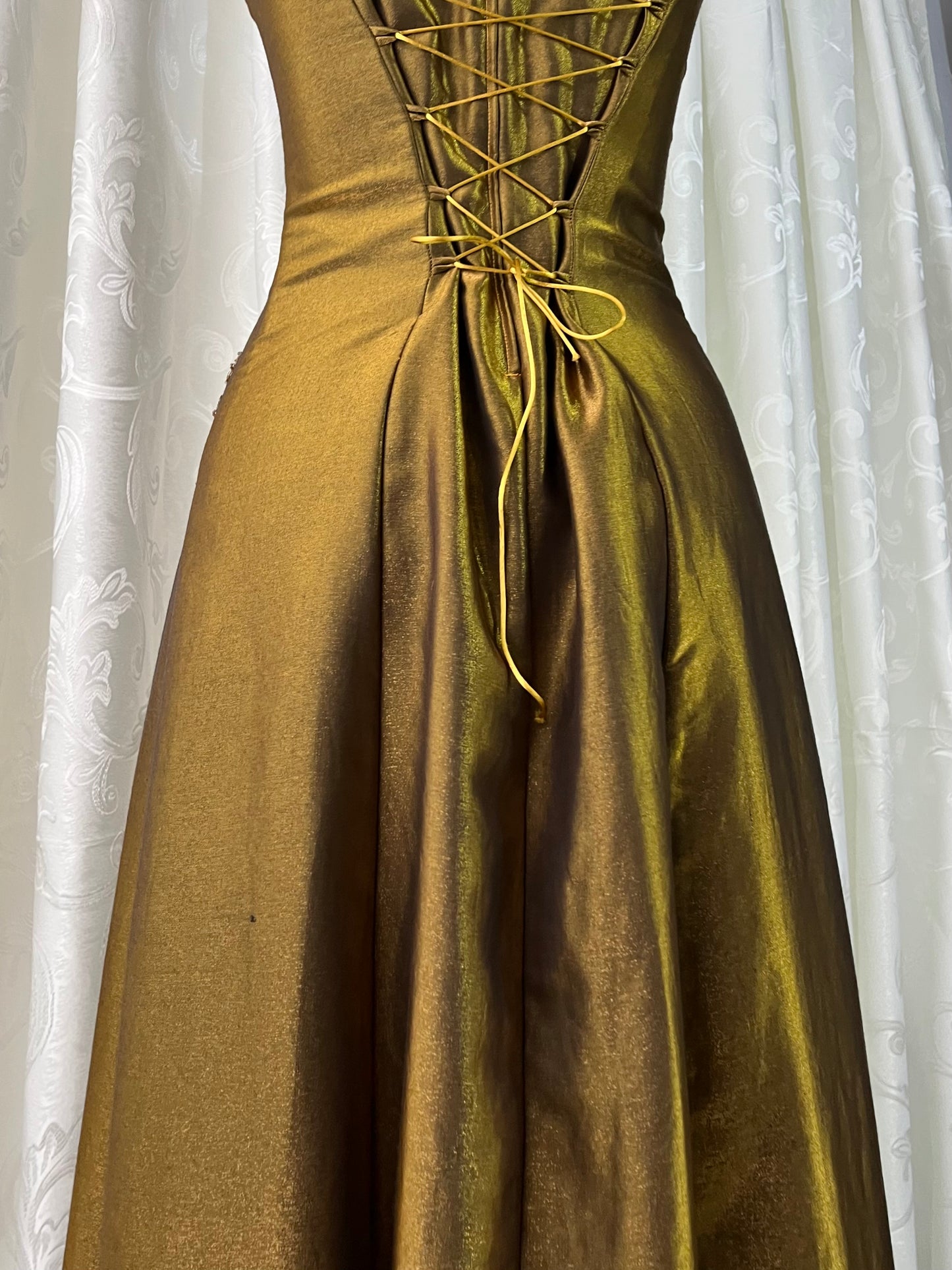 Iridescent brooch dress with fine bead embroidery