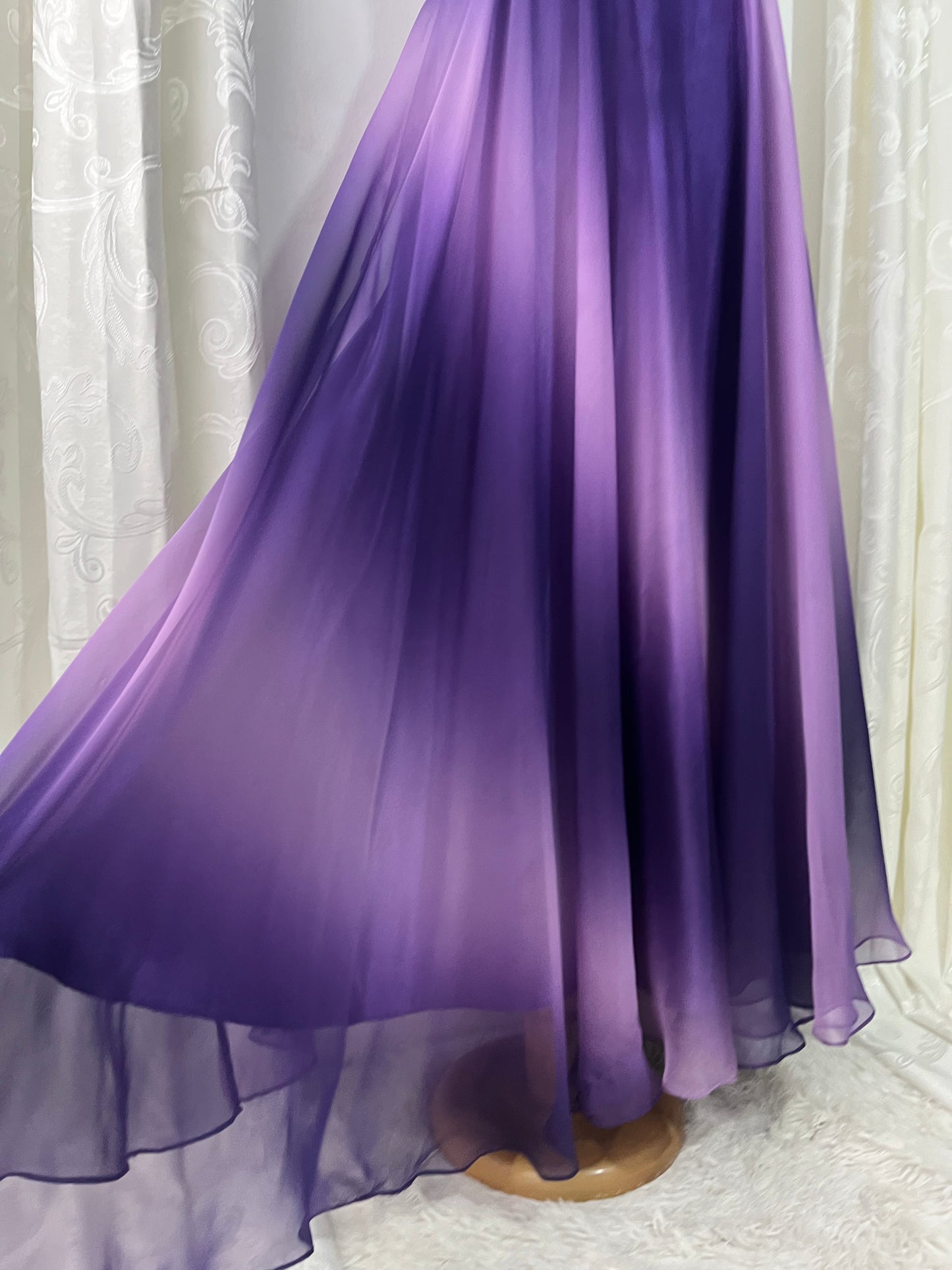 Gown in purple gradient chiffon with rhinestone appliqués at the waist and neckline