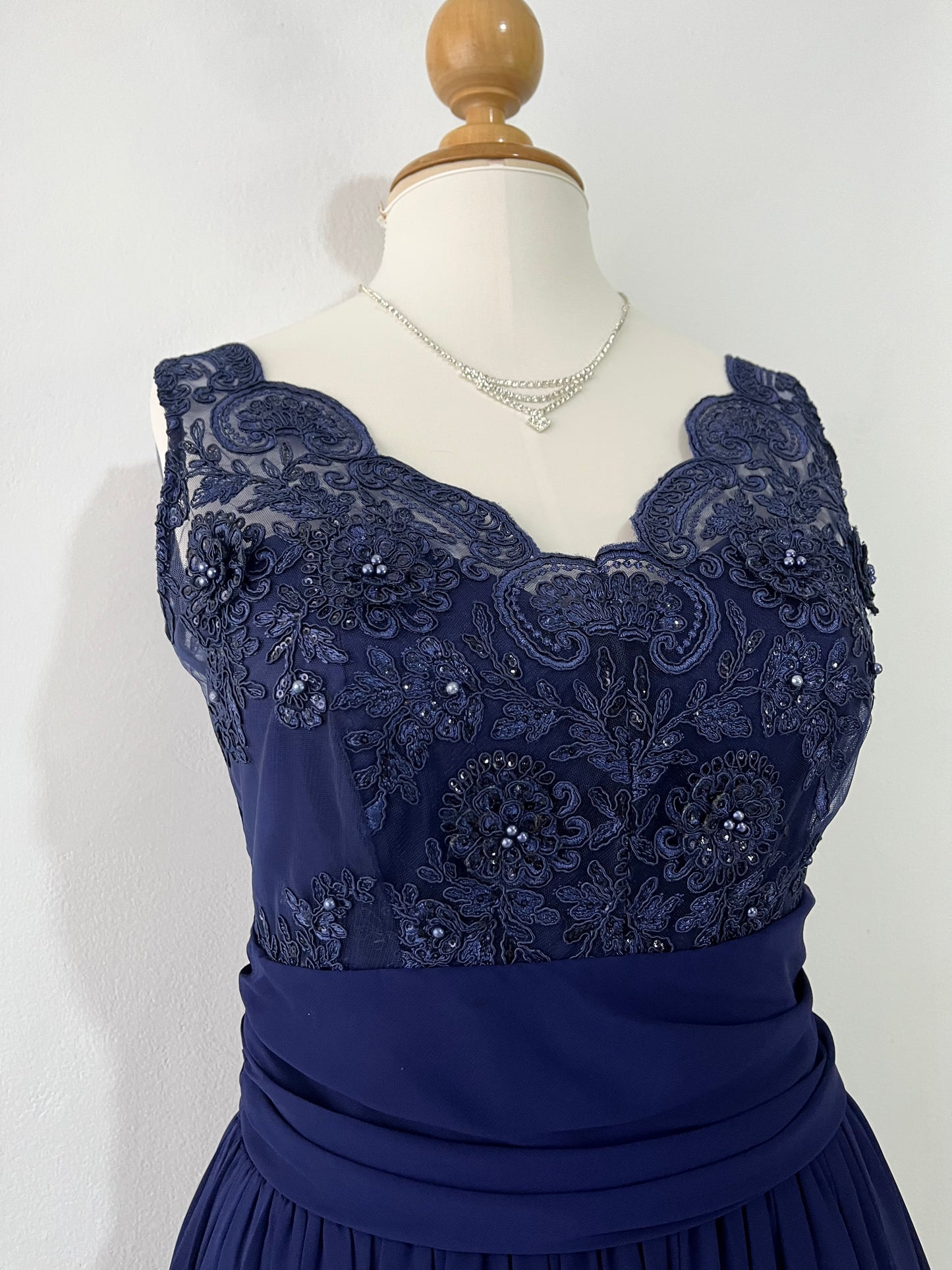 Captivating blue dress with embroidered floral designs and pearls on the chest-Size L