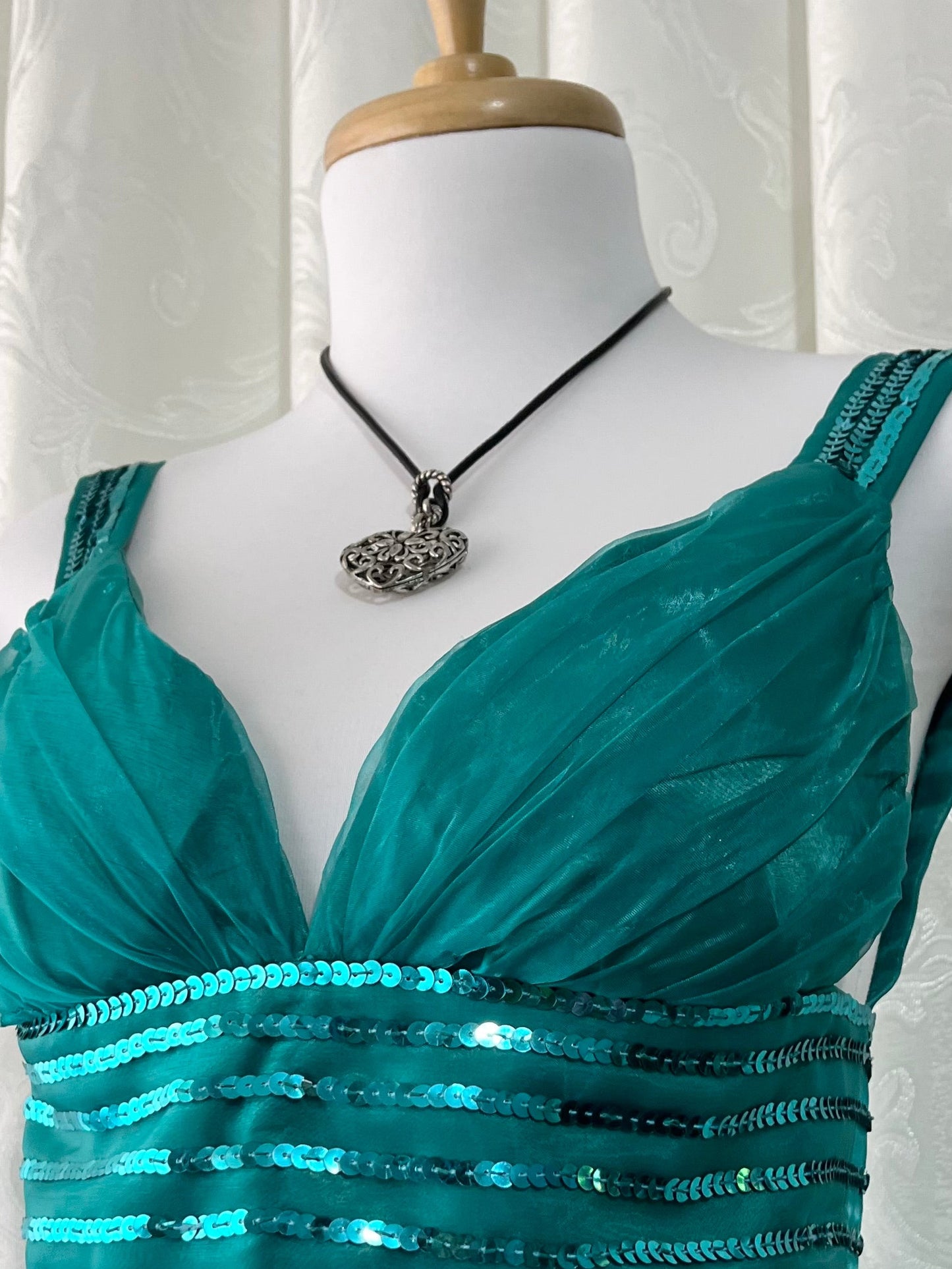 Turquoise dress with sequined waistband and matchinf cape