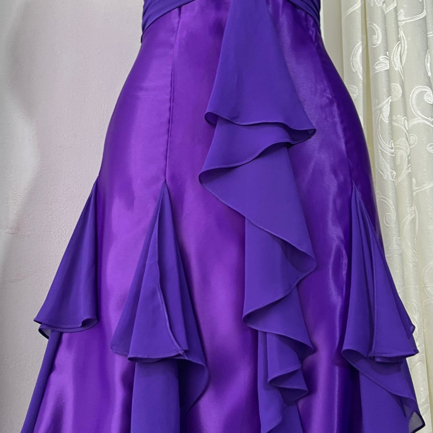 Royal purple corset gown with ruffles