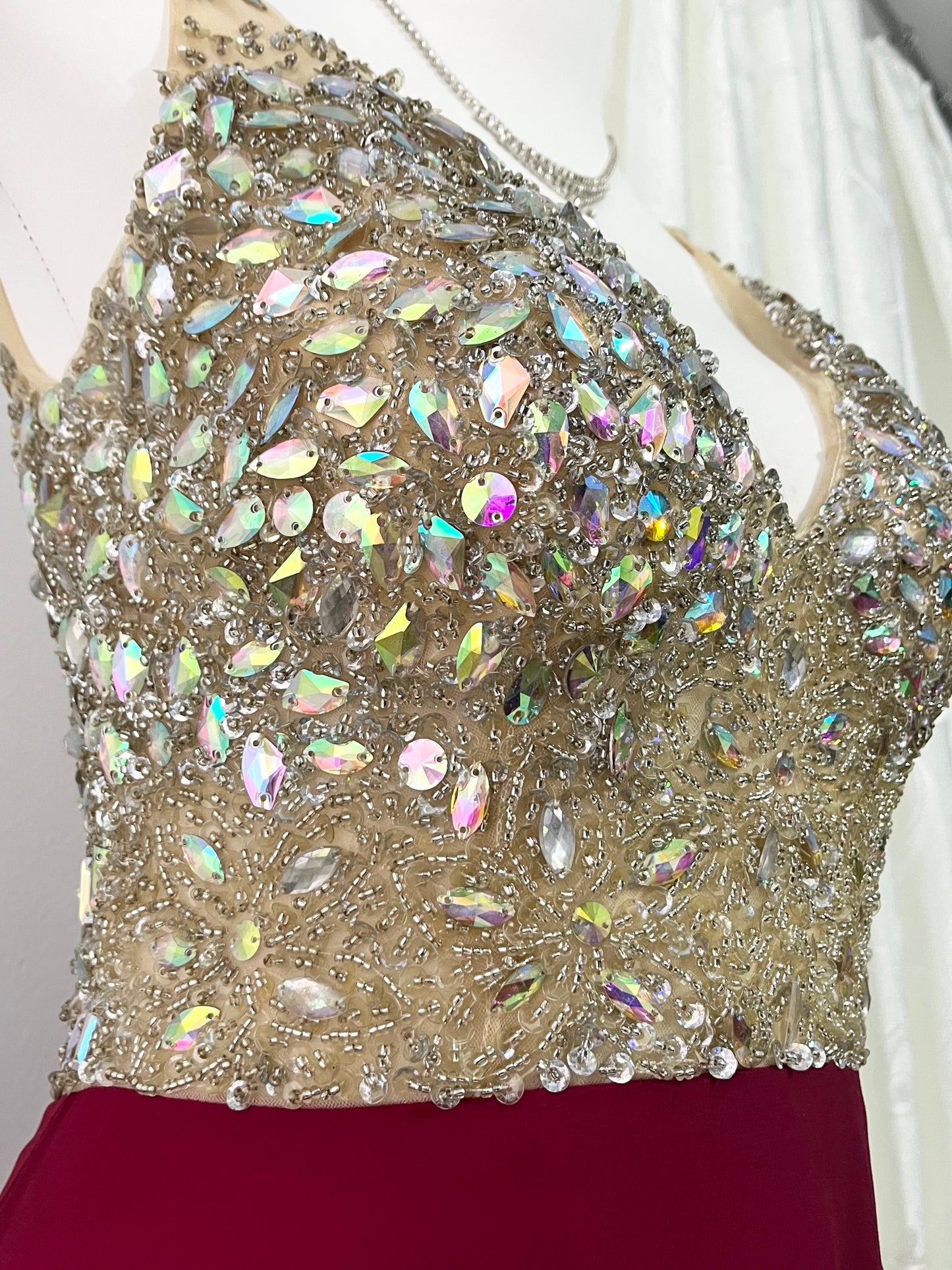 Evening gown with a bodice exquisitely hand-decorated with rhinestones and embellishments