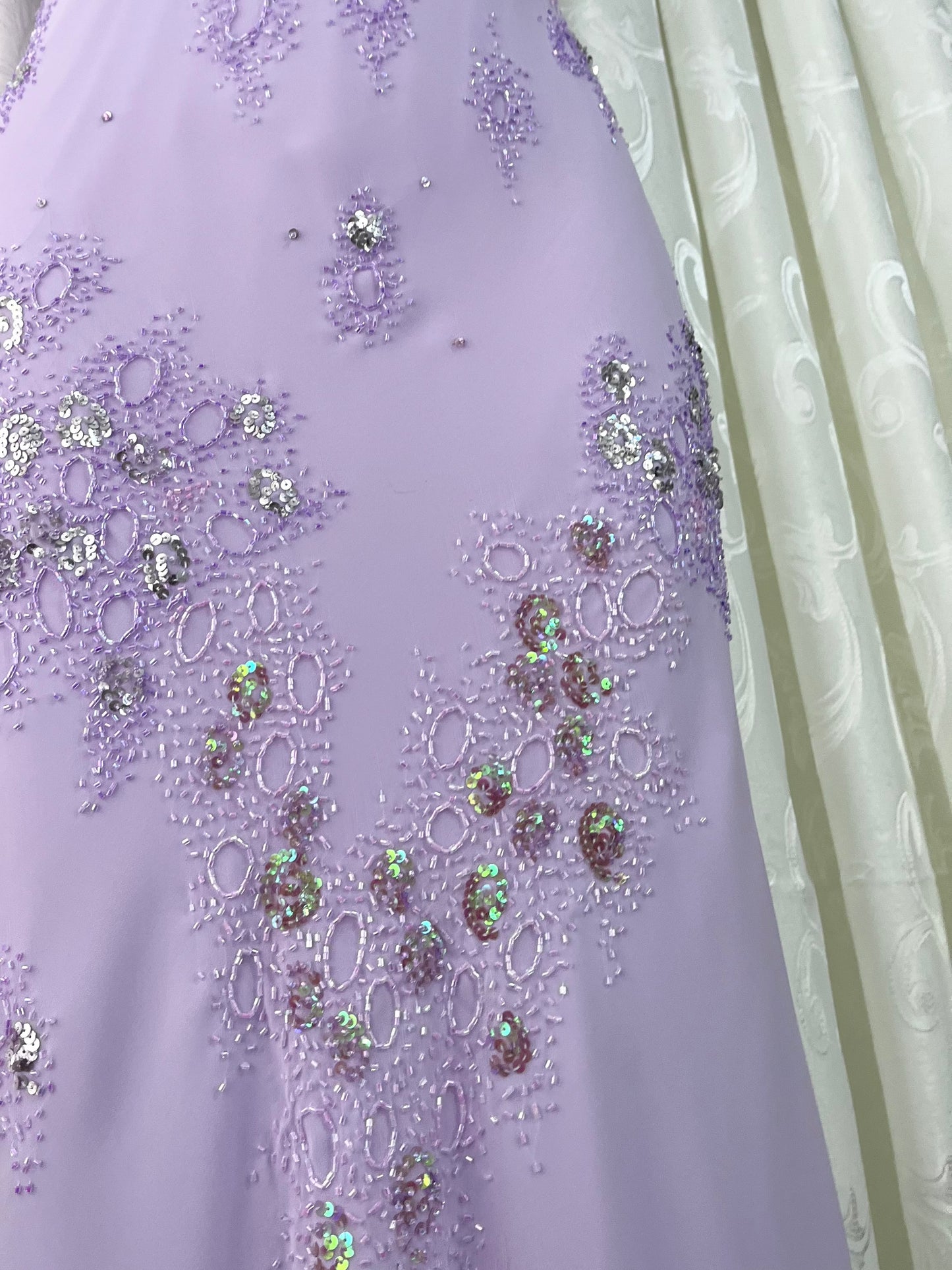 Captivating long dress in pastel lavender with sequin and bead embroidery