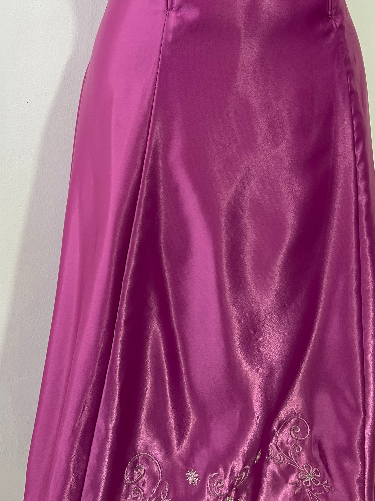 Magenta corset dress with floral designs embroidered in lilac and silver thread