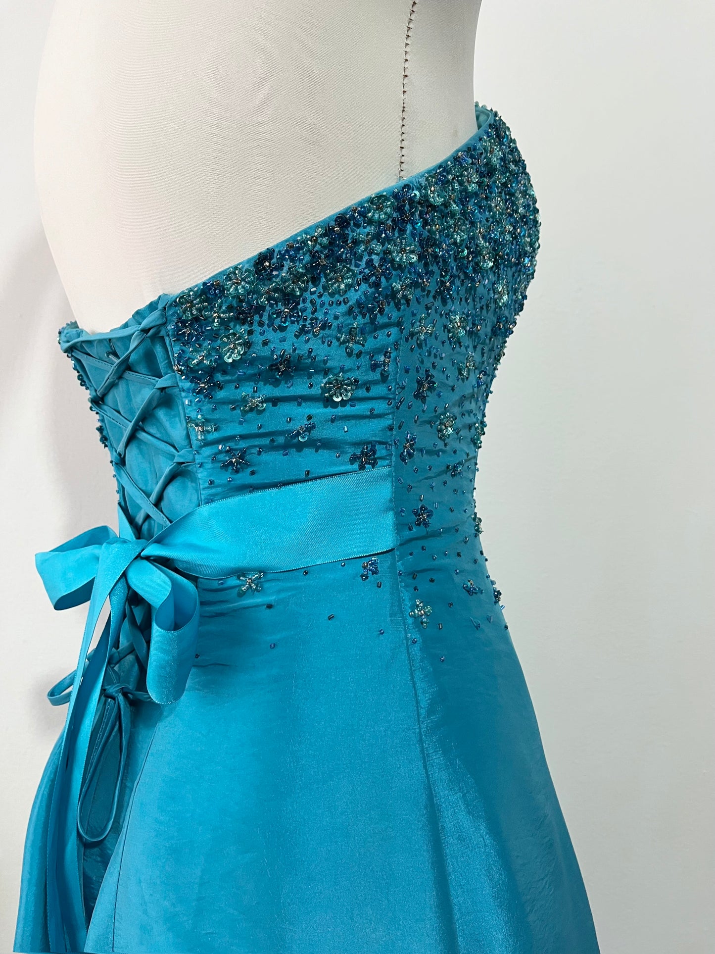 Corset evening dress in a vibrant turquoise color with exquisite handmade floral embroidery- size S