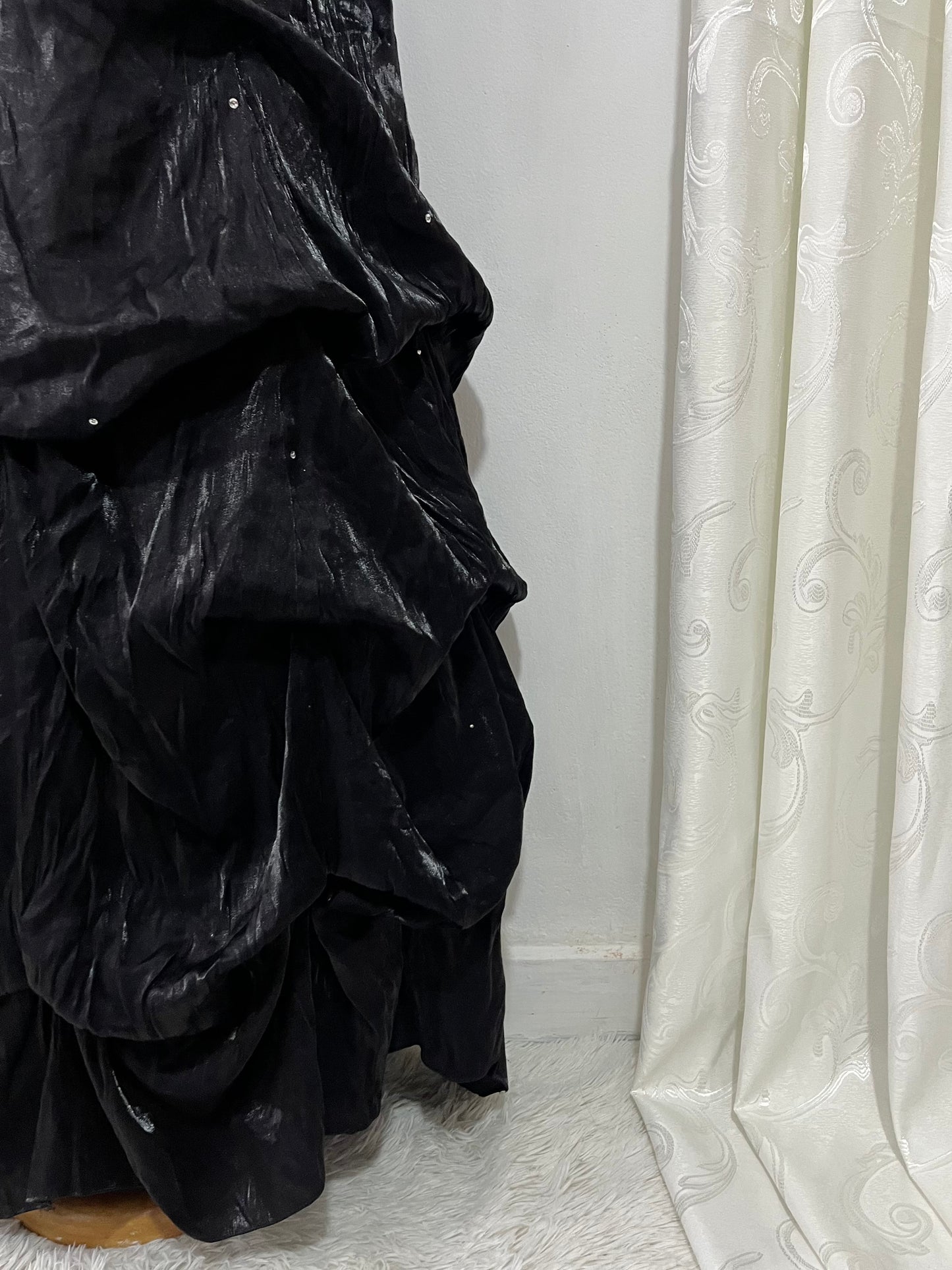 Noir and ivory gown with a skirt featuring gathered details, rhinestone appliqués, and sparkling embellishments.- size M/L