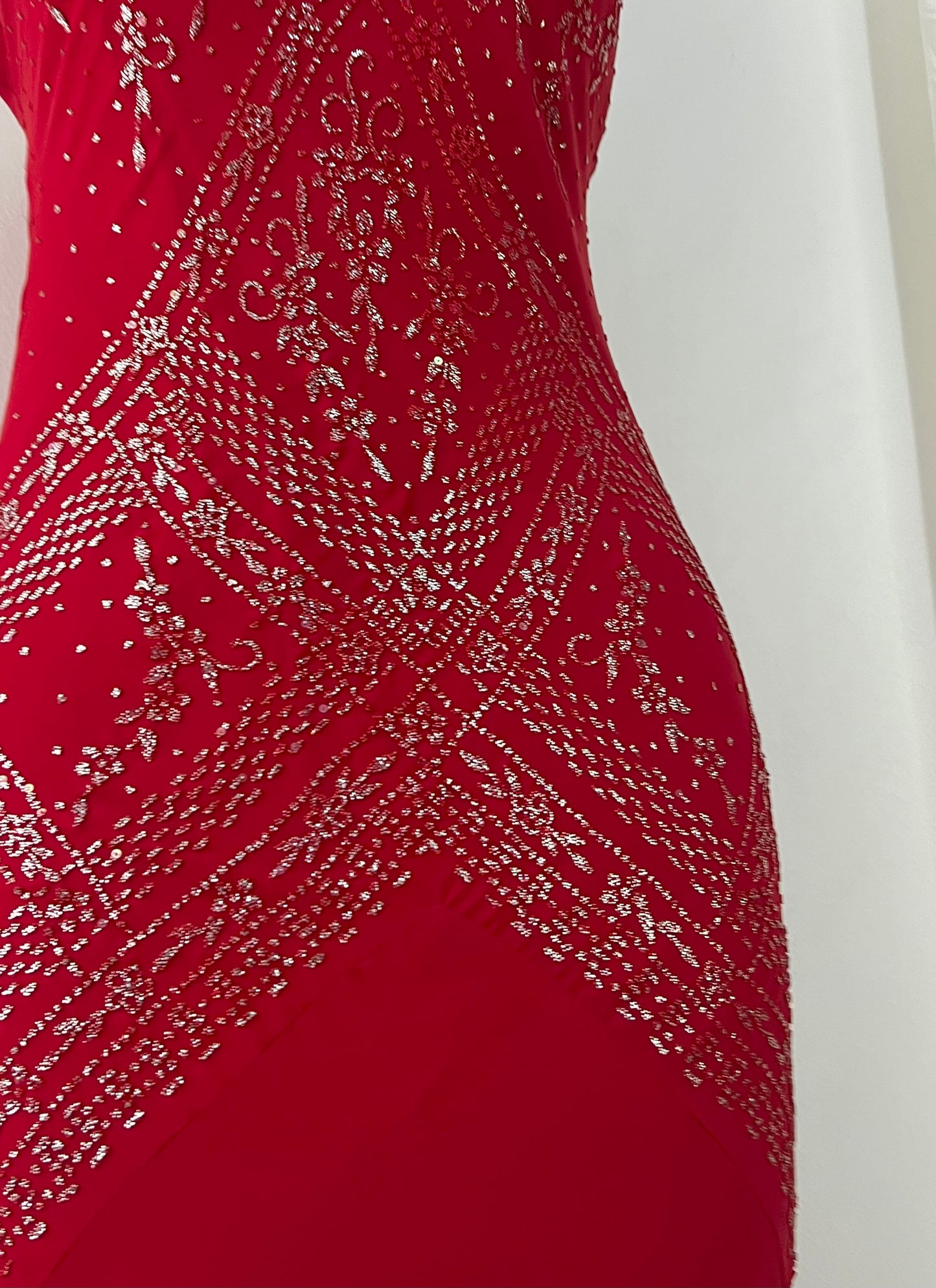 Crimson red ball gown with silver embellishments