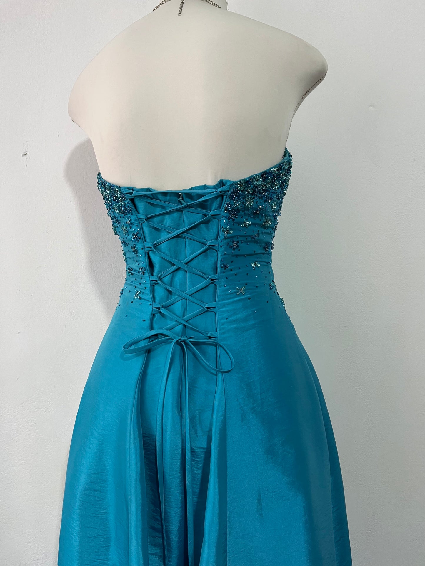 Corset evening dress in a vibrant turquoise color with exquisite handmade floral embroidery- size S