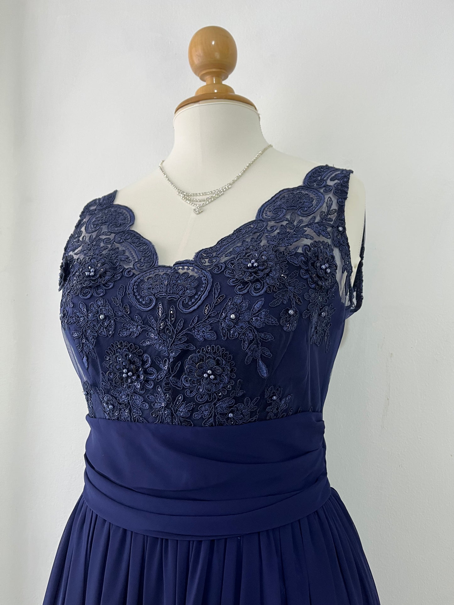 Captivating blue dress with embroidered floral designs and pearls on the chest-Size L