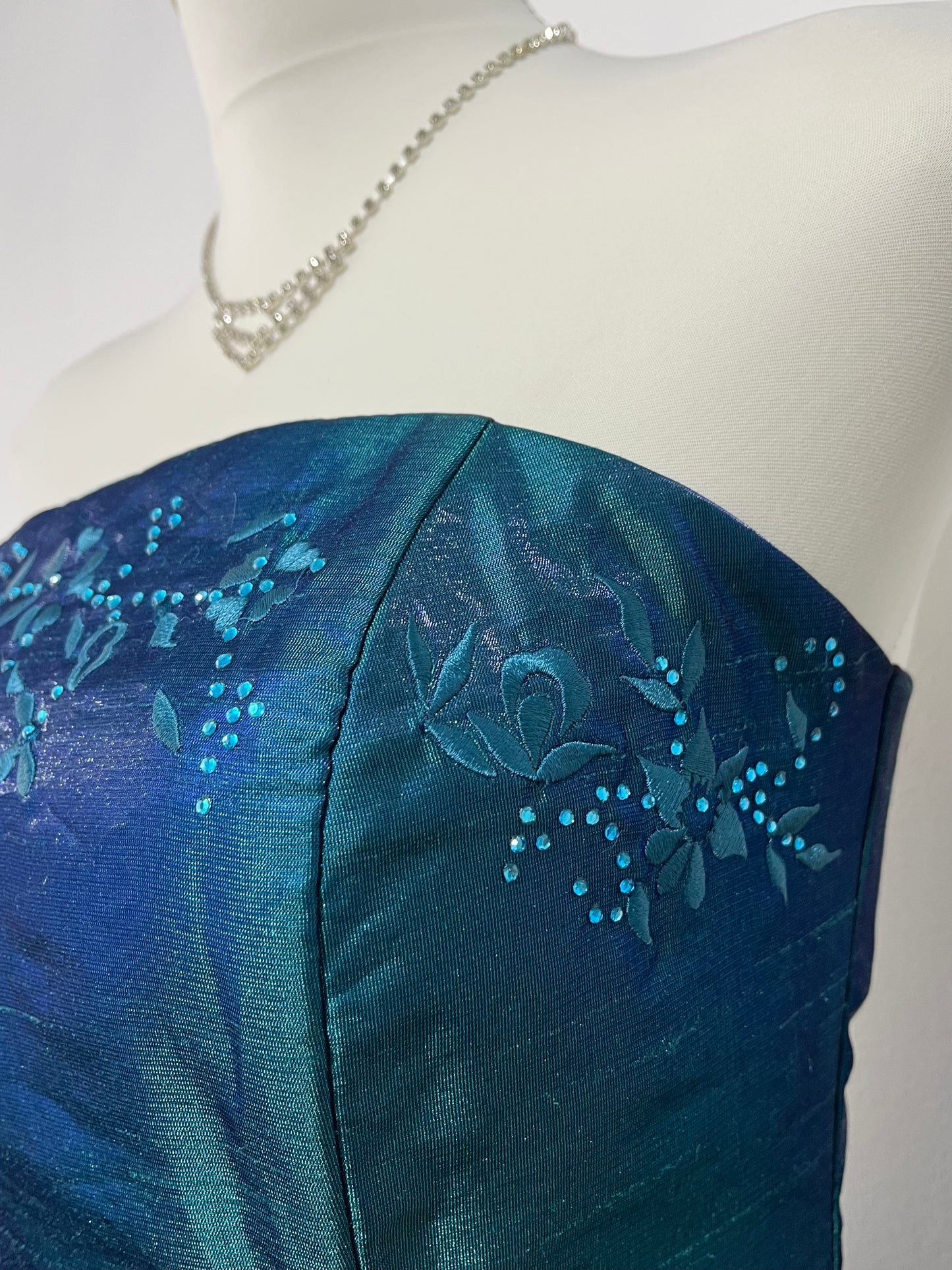 Teal corset dress in iridescent taffeta with floral appliqués and embroidery- size S