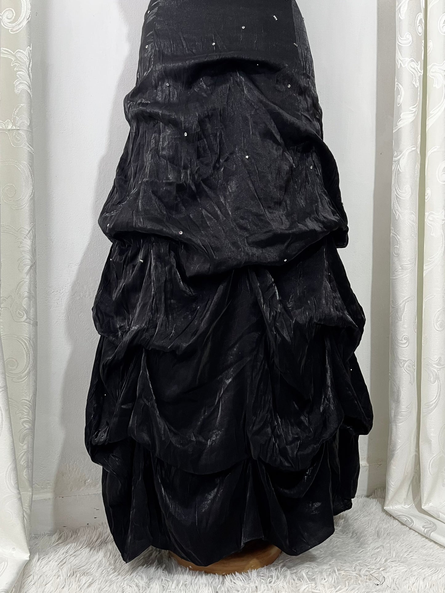 Noir and ivory gown with a skirt featuring gathered details, rhinestone appliqués, and sparkling embellishments.- size M/L