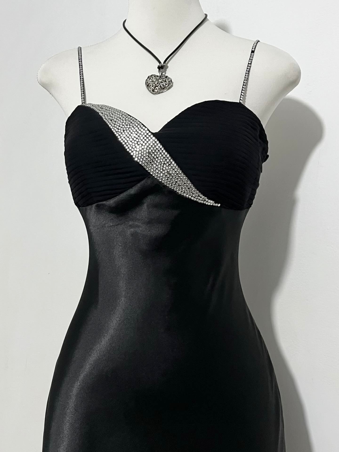 Noir silk satin dress with silver appliqués