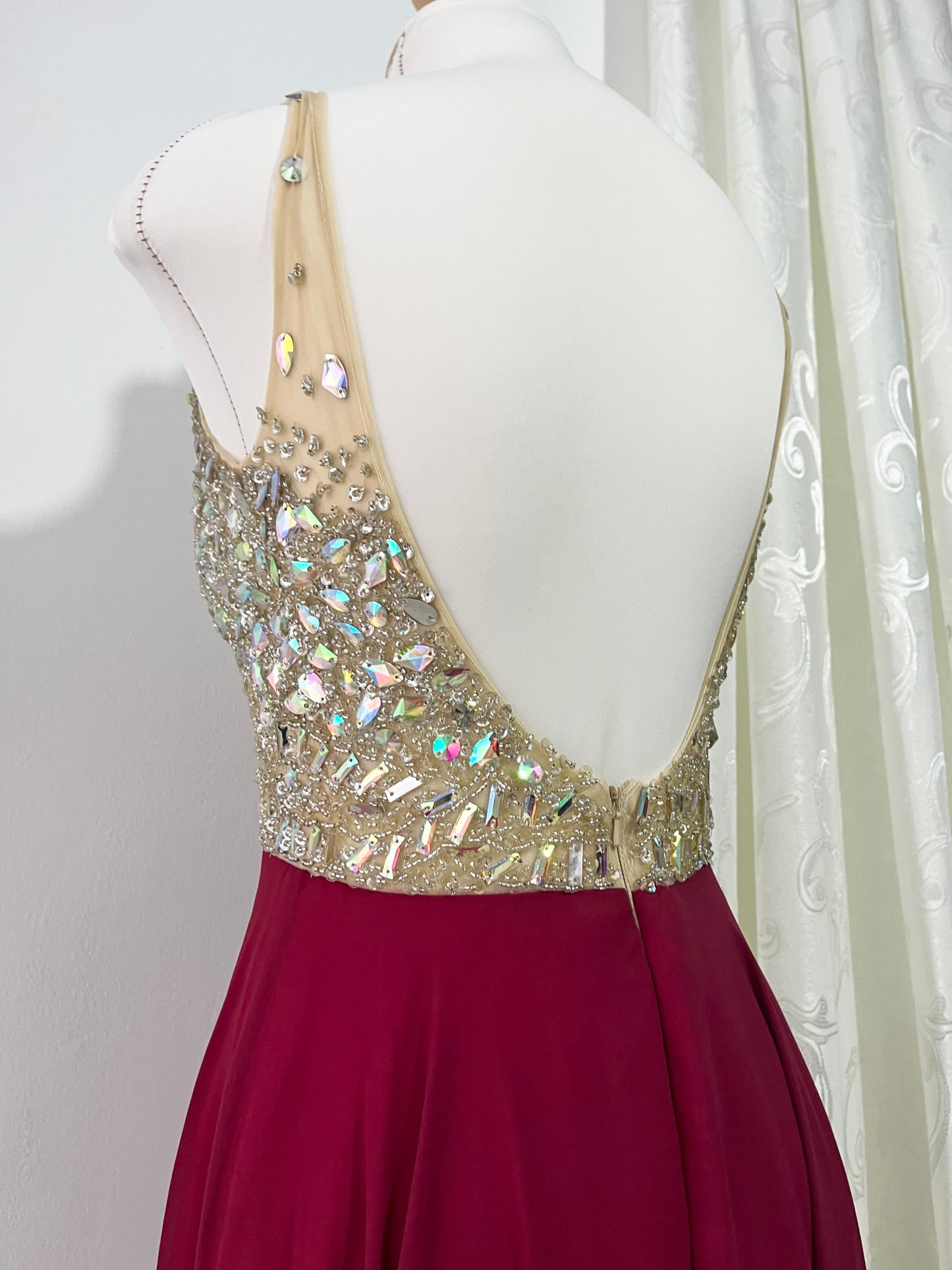 Evening gown with a bodice exquisitely hand-decorated with rhinestones and embellishments