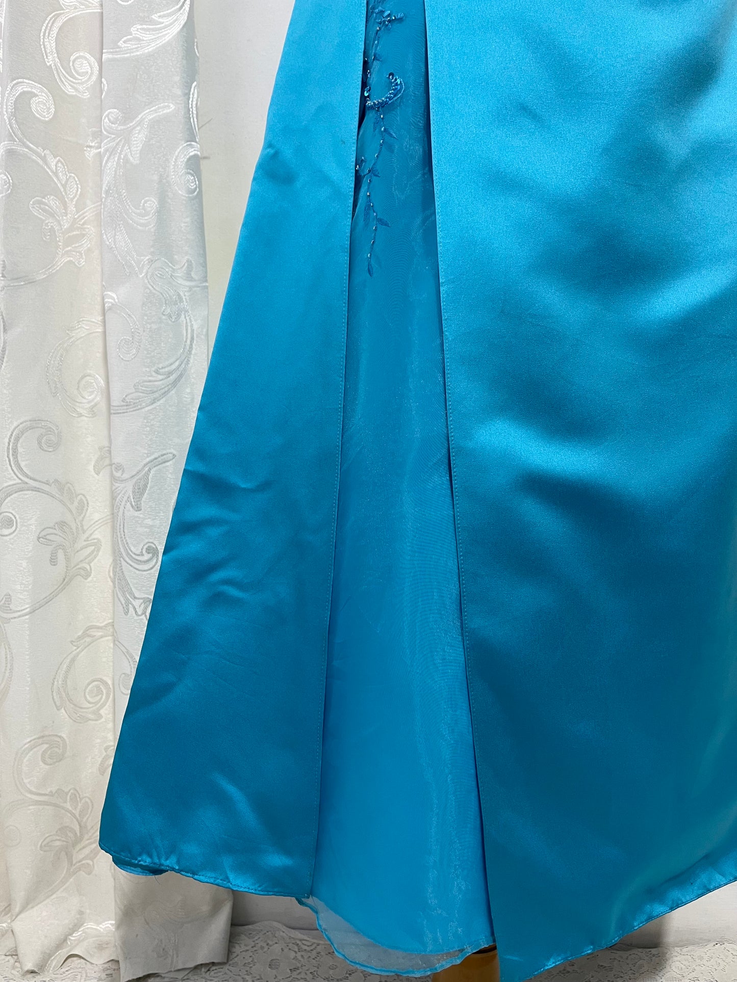 Turquoise sweetheart neckline gala gown with floral embellishments and asymmetric draped detail - size M