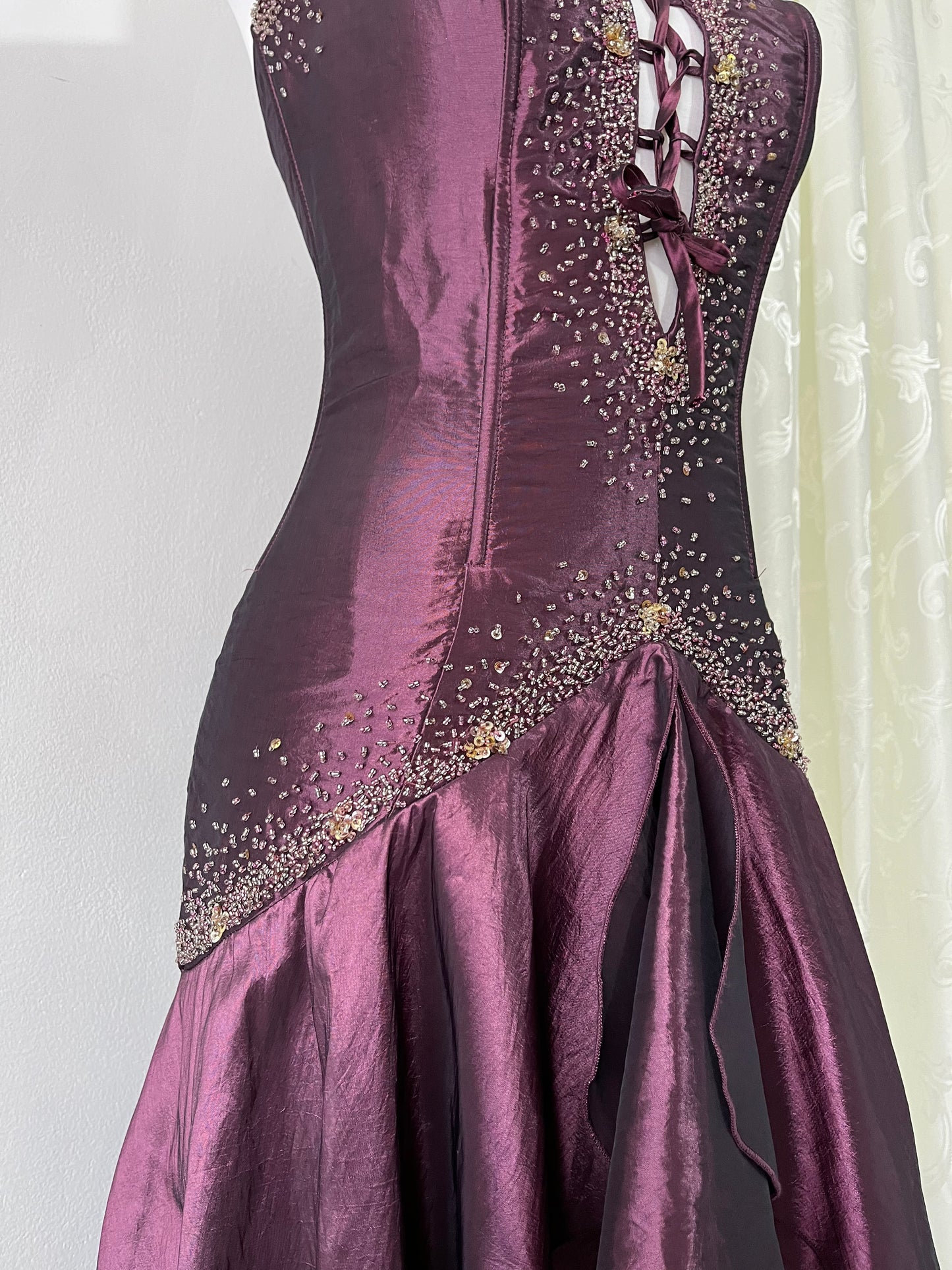 Deep purple corset dress with exquisite embellishments and hand-embroidered beads