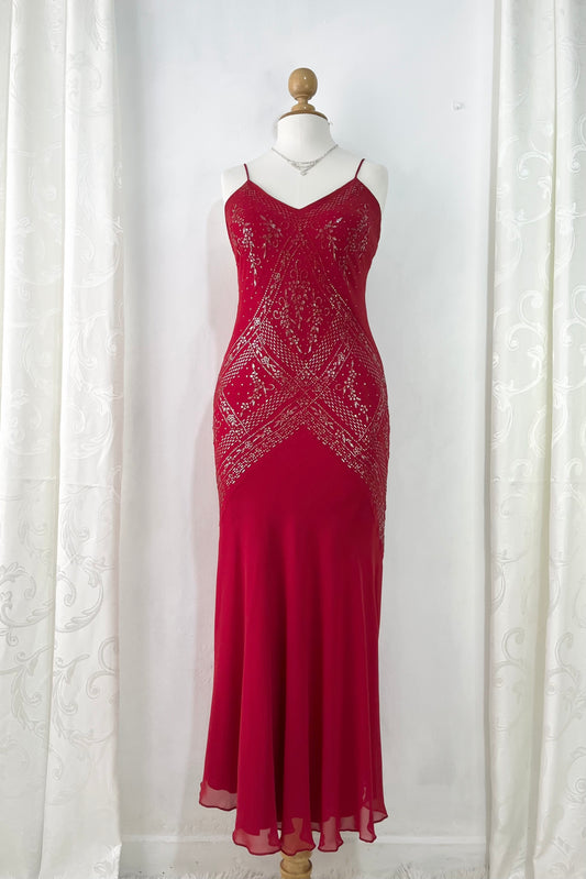 Crimson red ball gown with silver embellishments