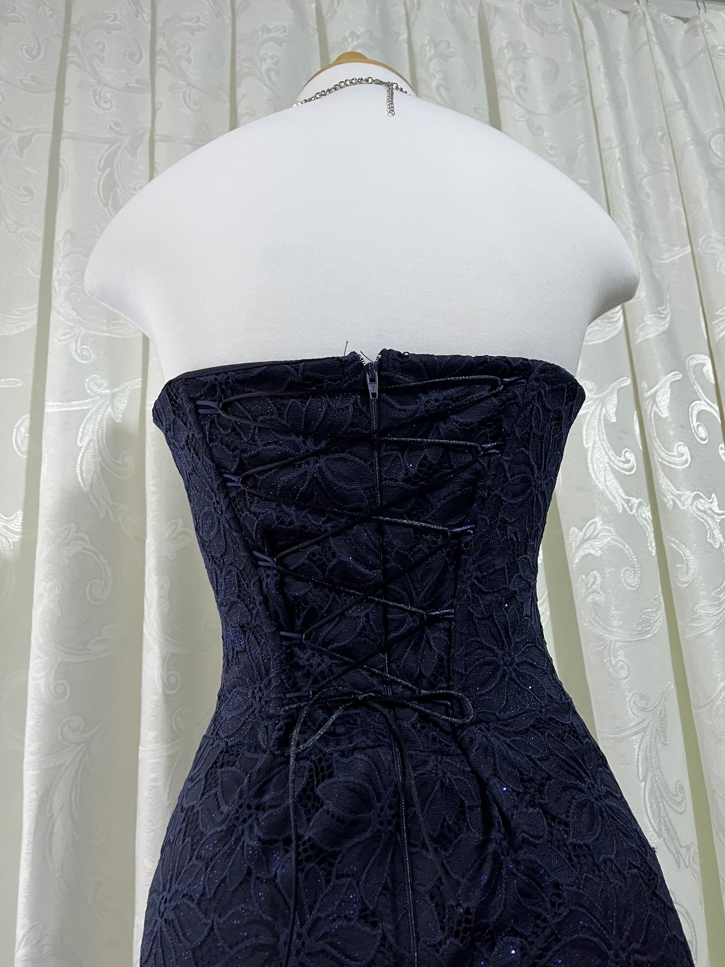 Dark blue corset lace dress with embroidered design