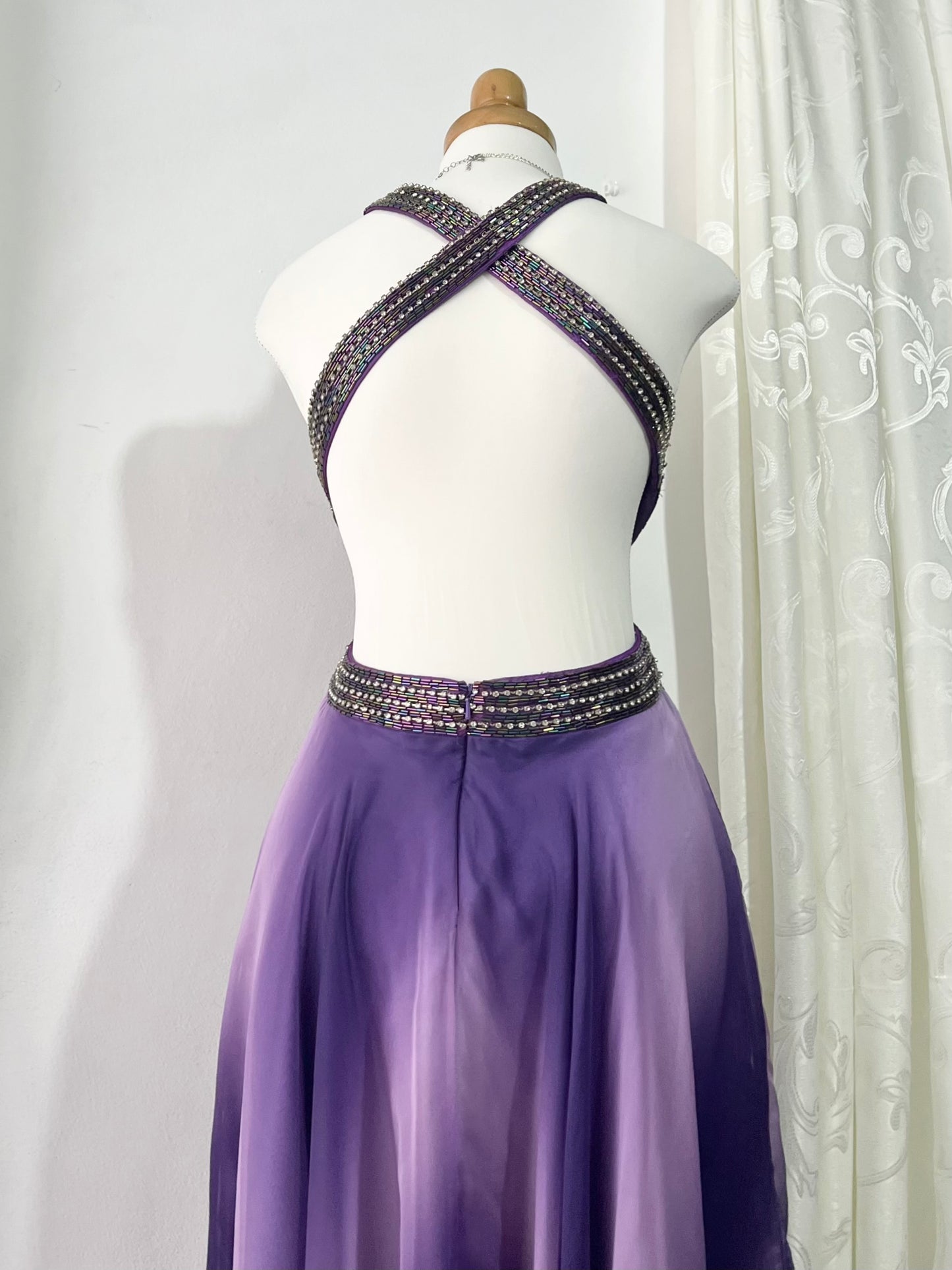 Gown in purple gradient chiffon with rhinestone appliqués at the waist and neckline