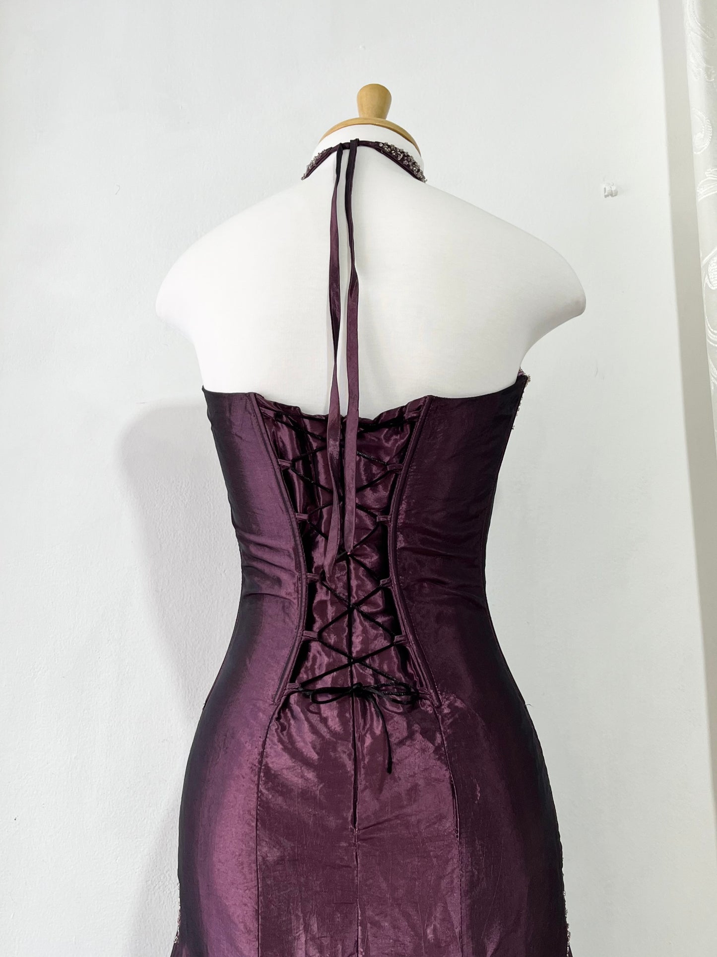 Deep purple corset dress with exquisite embellishments and hand-embroidered beads