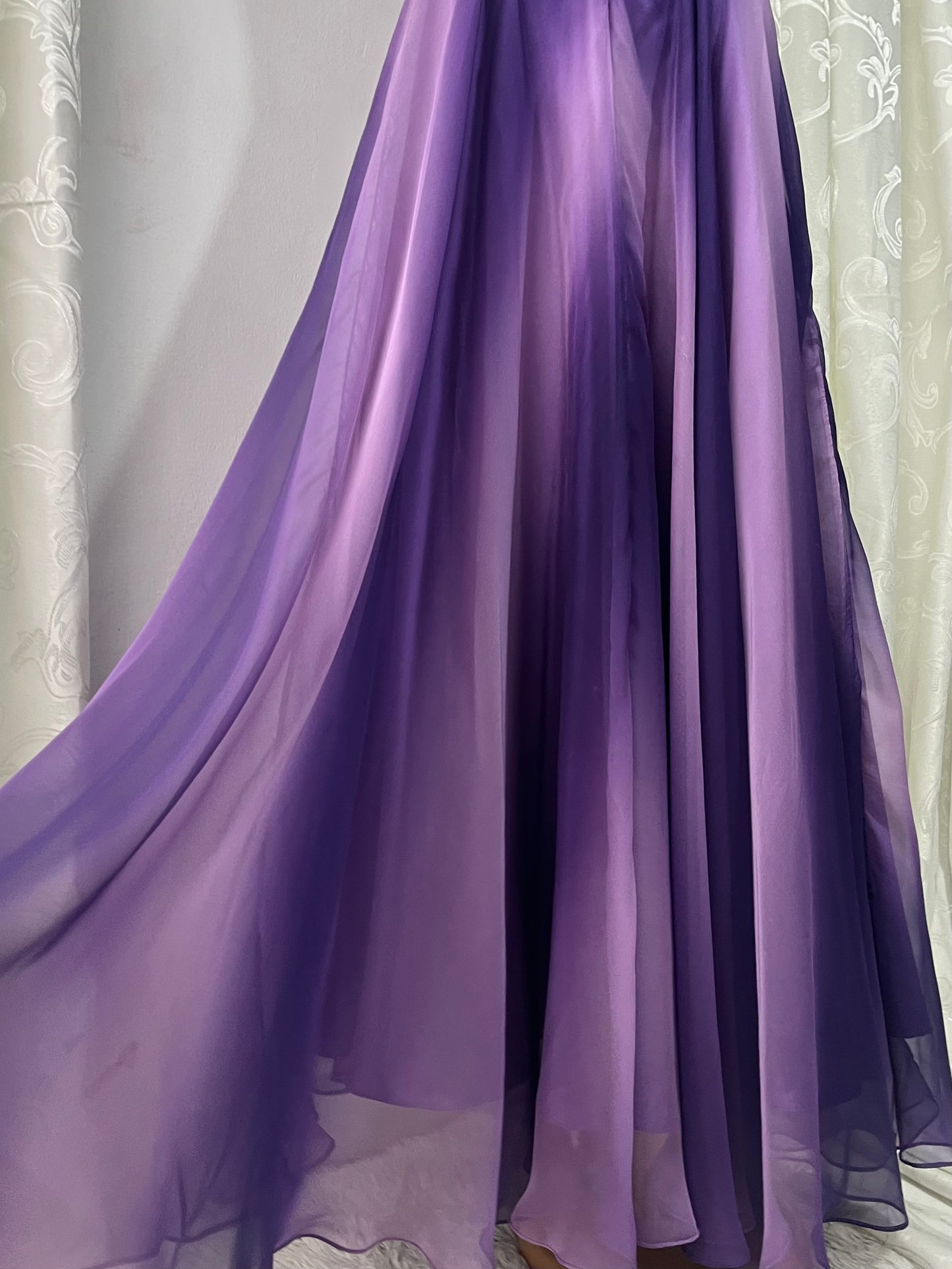 Gown in purple gradient chiffon with rhinestone appliqués at the waist and neckline