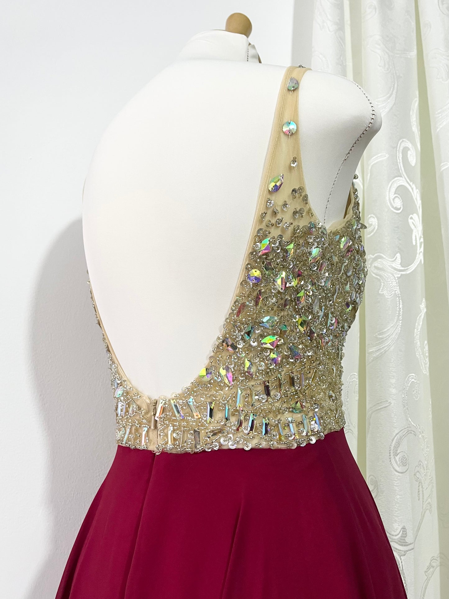 Evening gown with a bodice exquisitely hand-decorated with rhinestones and embellishments
