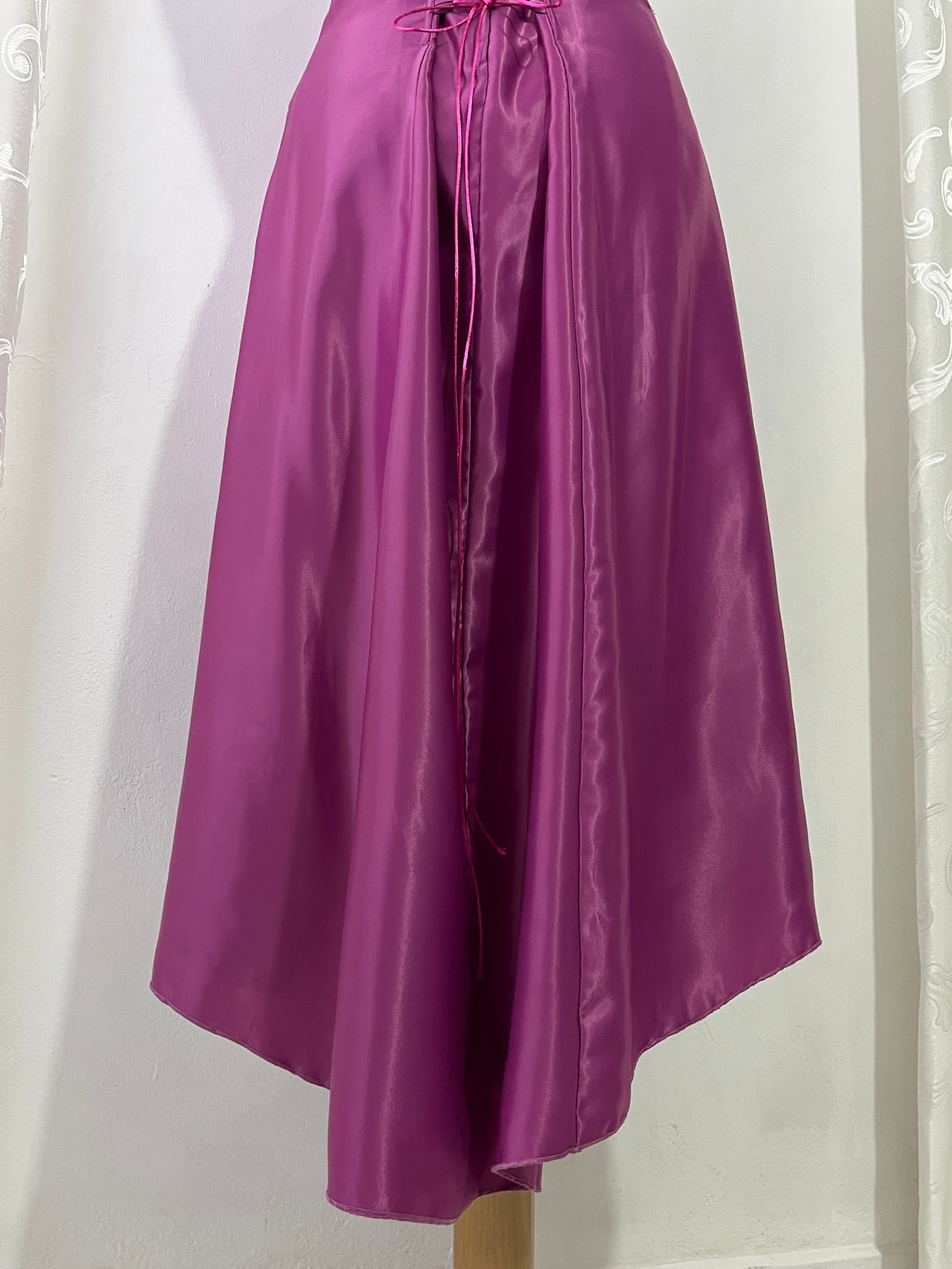 Magenta corset dress with floral designs embroidered in lilac and silver thread