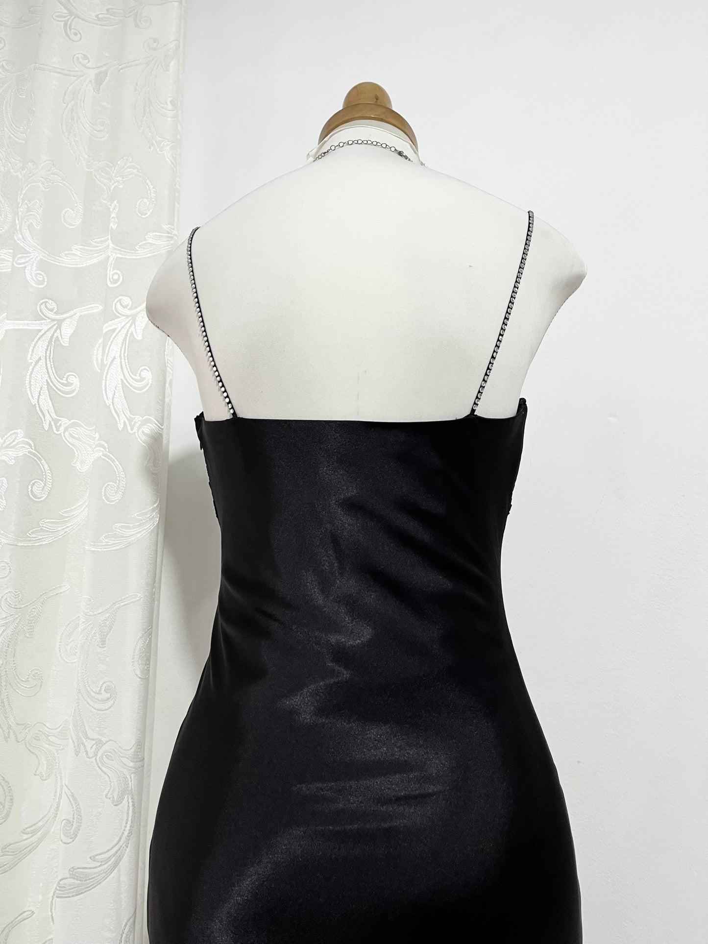 Noir silk satin dress with silver appliqués