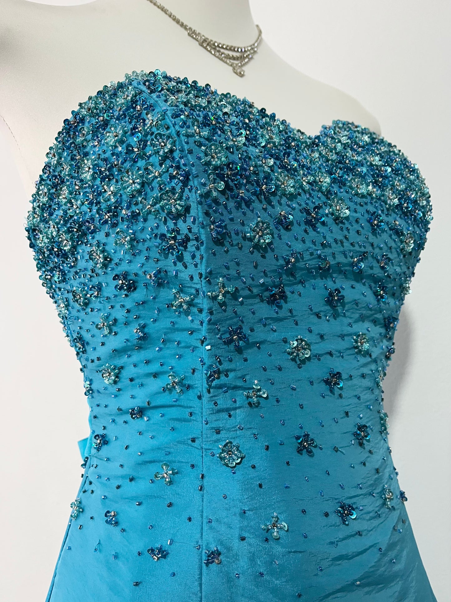 Corset evening dress in a vibrant turquoise color with exquisite handmade floral embroidery- size S