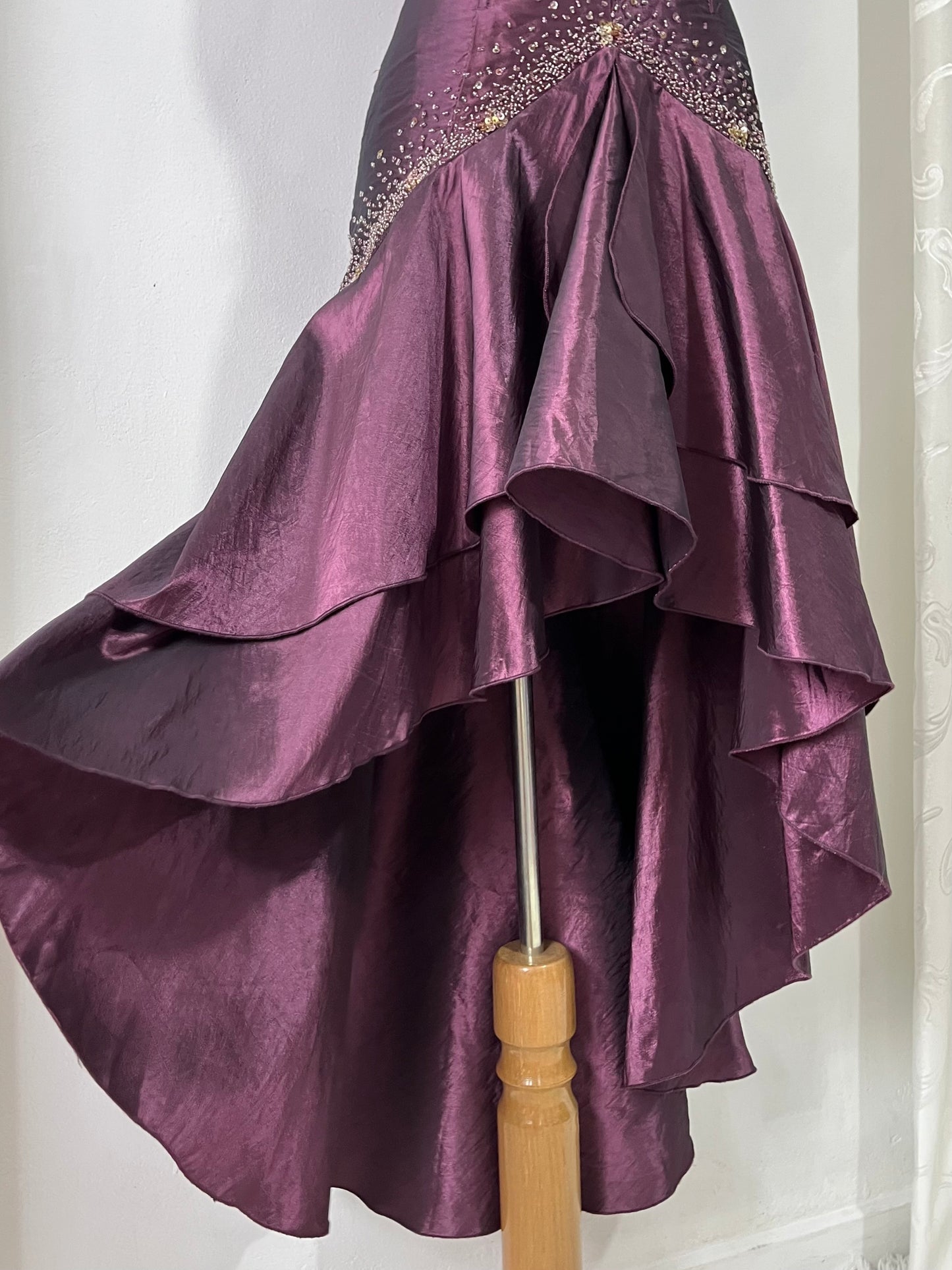 Deep purple corset dress with exquisite embellishments and hand-embroidered beads