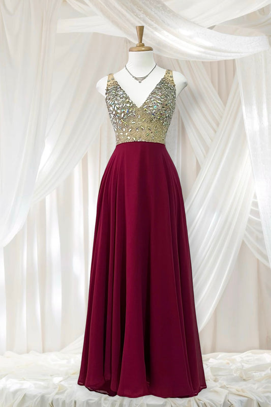 Evening gown with a bodice exquisitely hand-decorated with rhinestones and embellishments