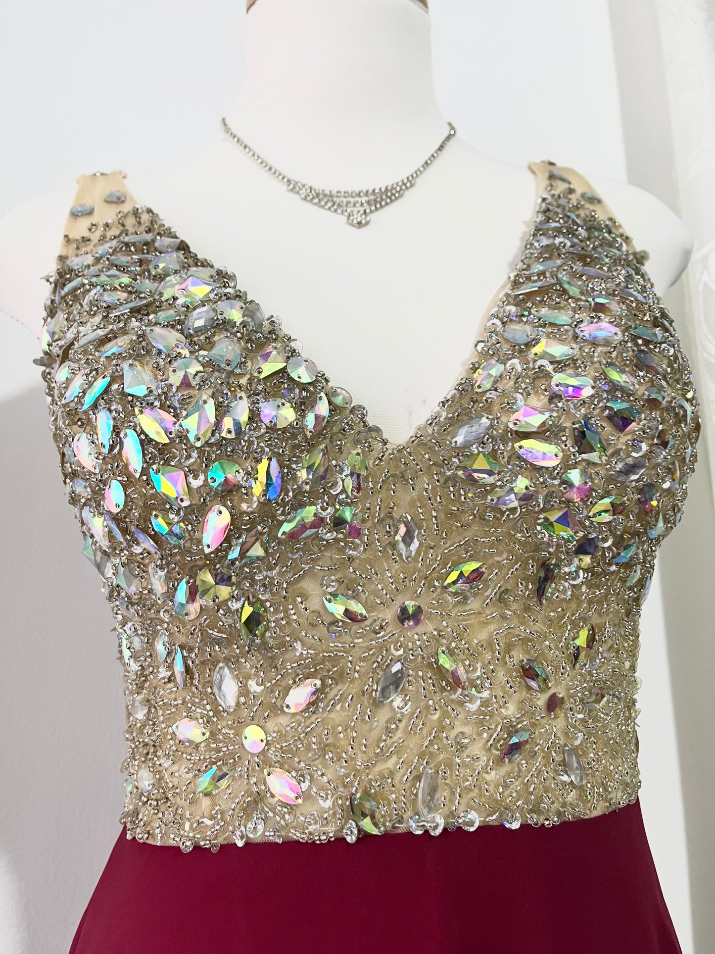 Evening gown with a bodice exquisitely hand-decorated with rhinestones and embellishments