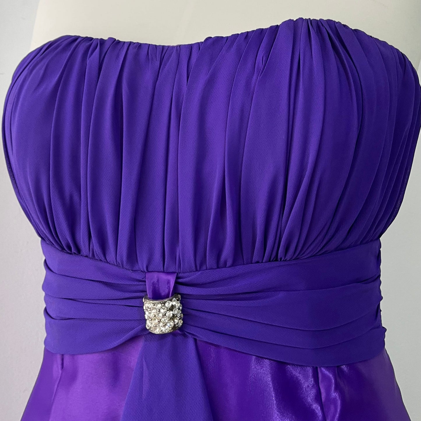 Royal purple corset gown with ruffles