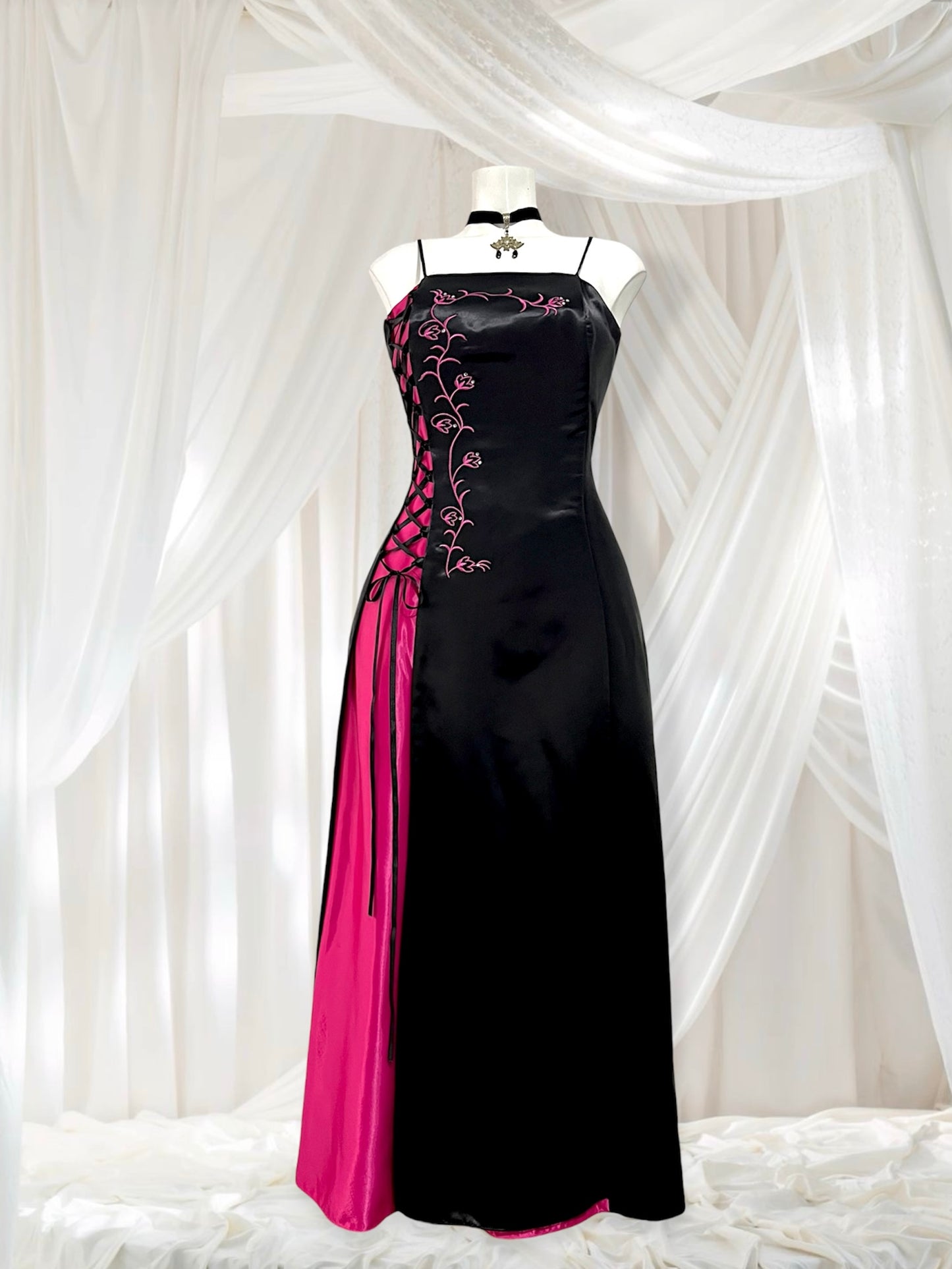 Noir and fuchsia corset dress with floral embroidery, rhinestones and adjustable strap