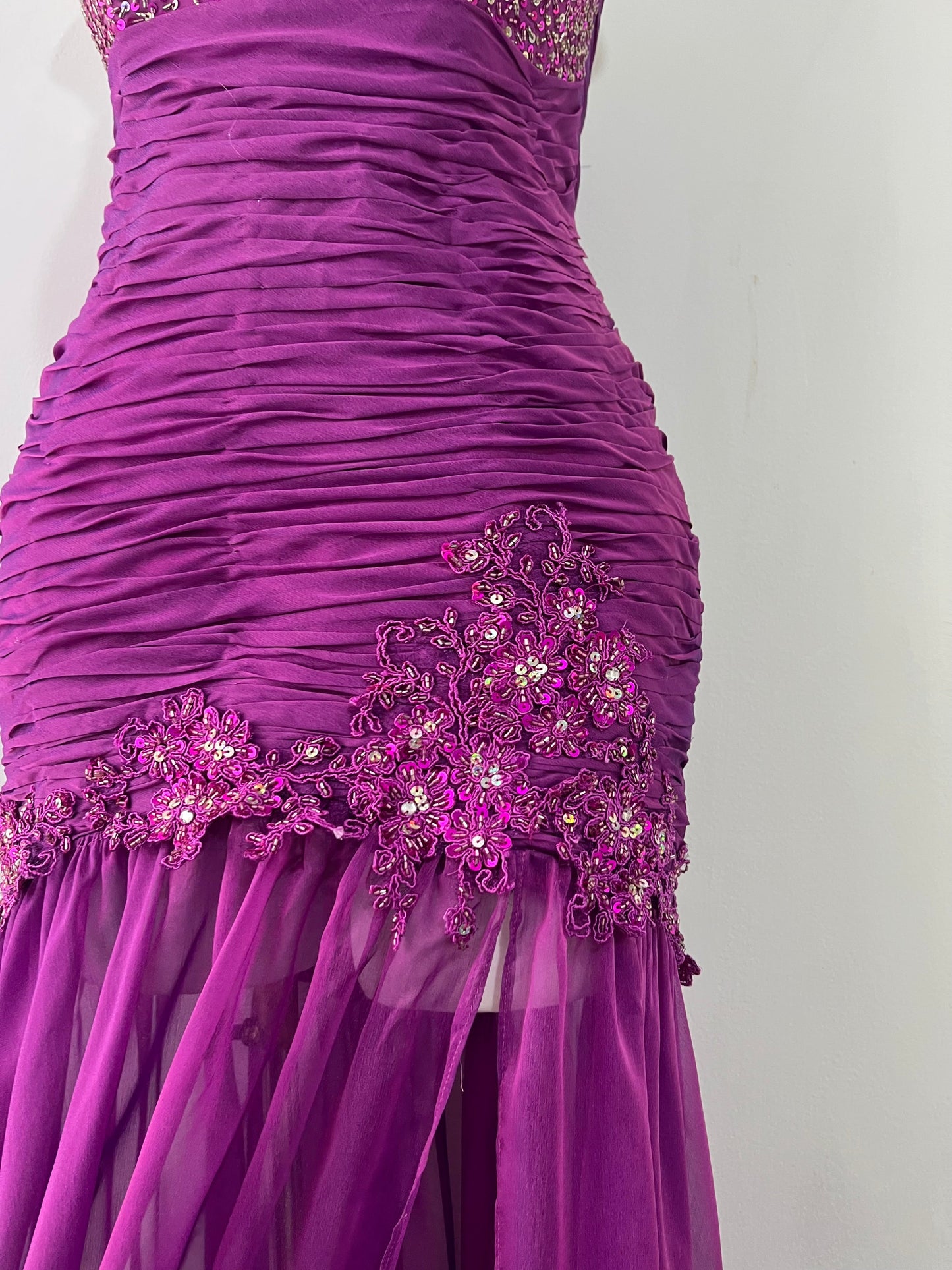 Purple corset dress with embroidered sequin and floral designs