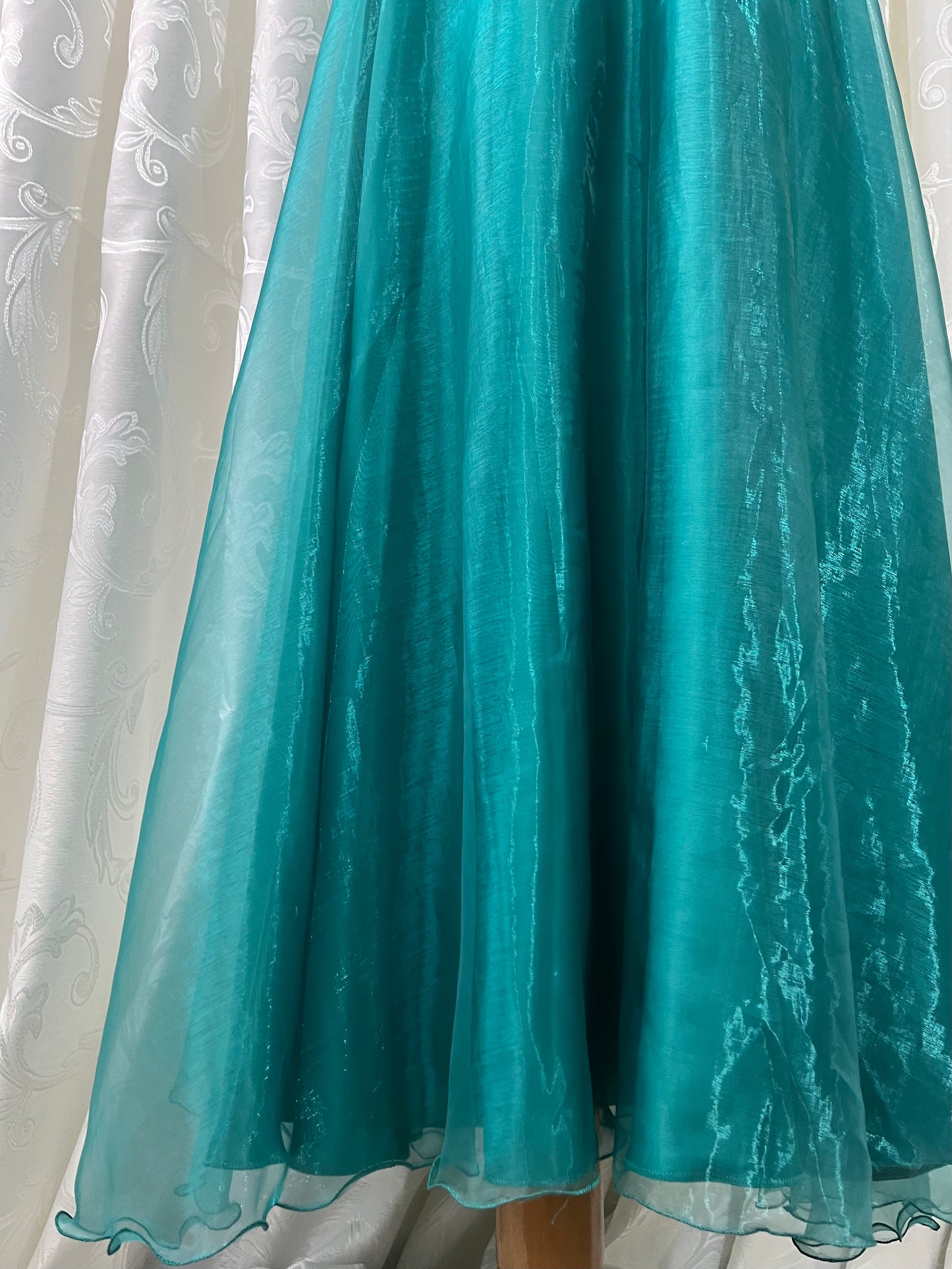 Turquoise dress with sequined waistband and matchinf cape