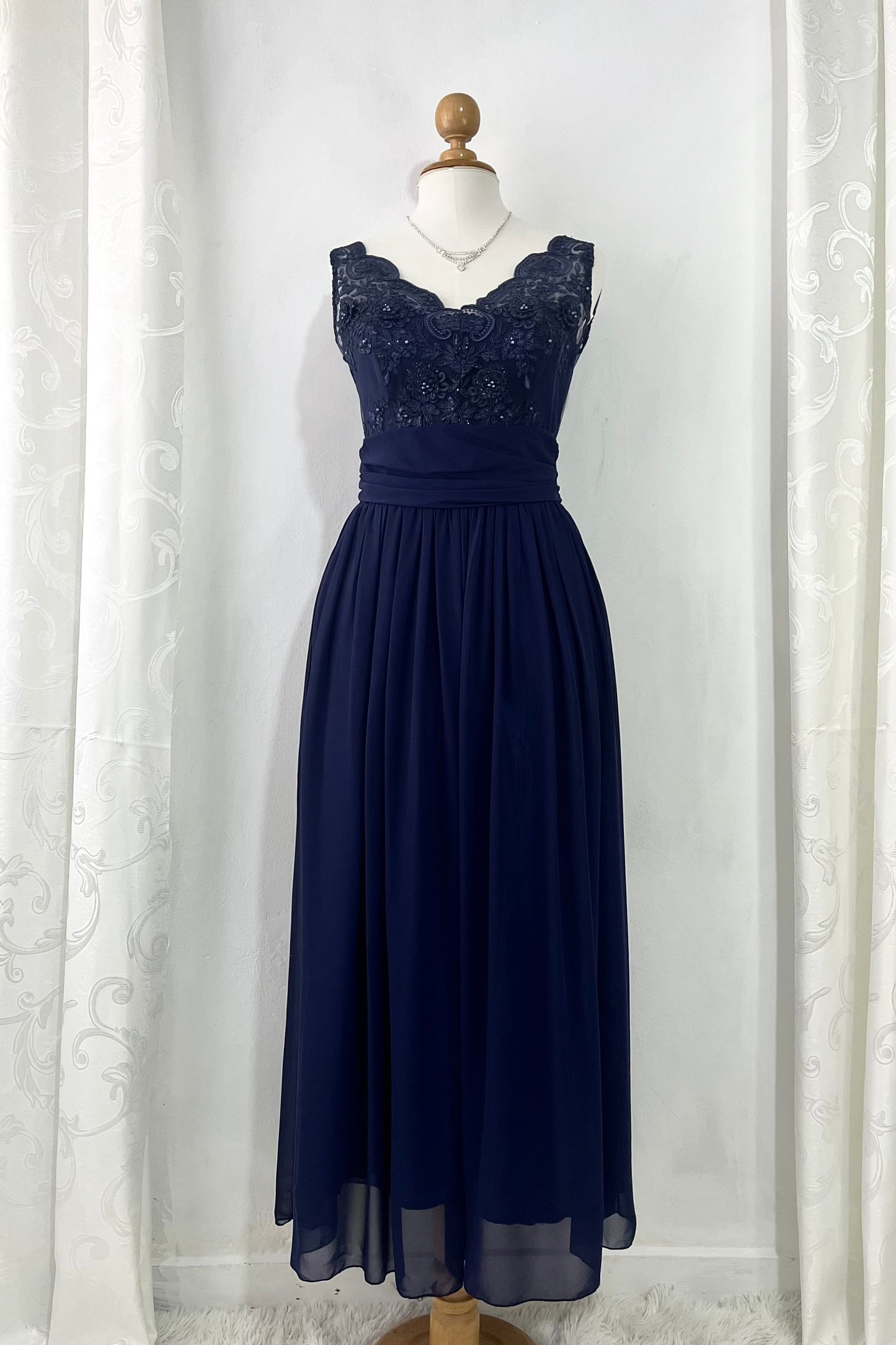Captivating blue dress with embroidered floral designs and pearls on the chest-Size L